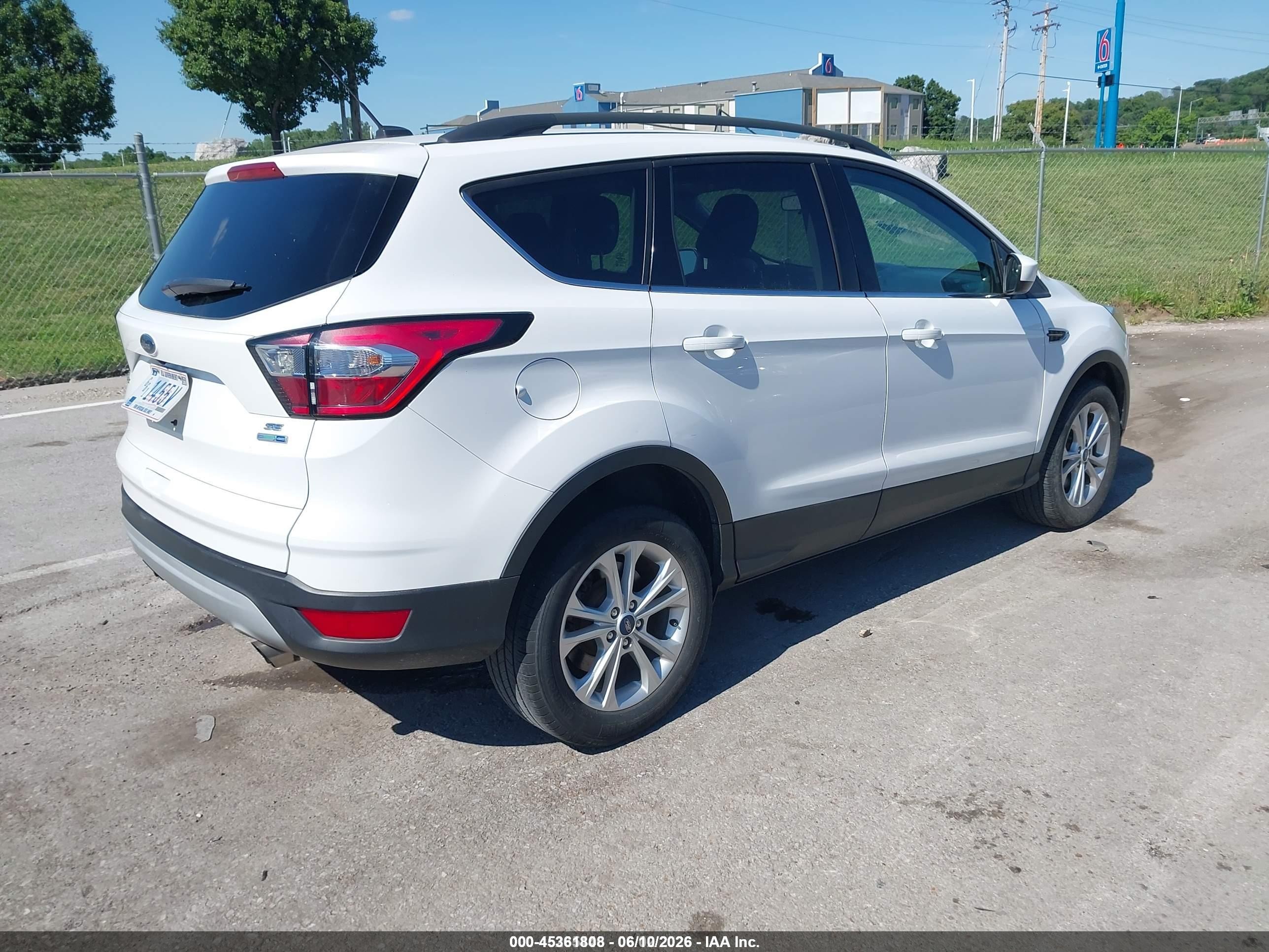 2018 Ford Escape VIN 1FMCU9GD7JUD08450 IAAI salvage auction — Normal Wear, SF97 (Illinois), sold $4,750 on 2026-07-09 (photo 4)