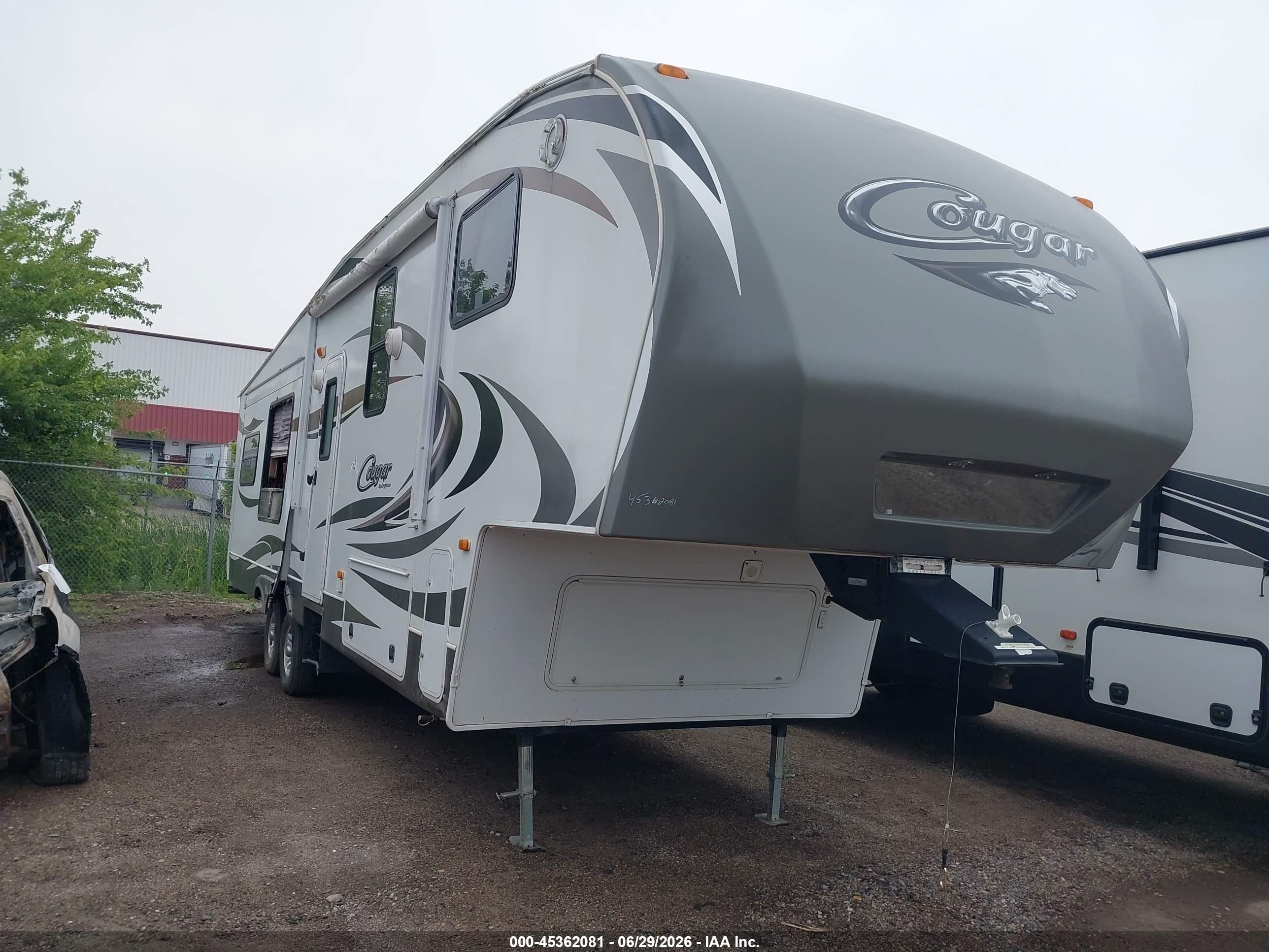 2012 Keystone Rv Cougar VIN 4YDF3272XC2504968 IAAI salvage auction — Storm Damage, Clear (North Dakota), sold $2,550 on 2026-09-30 (photo 1)
