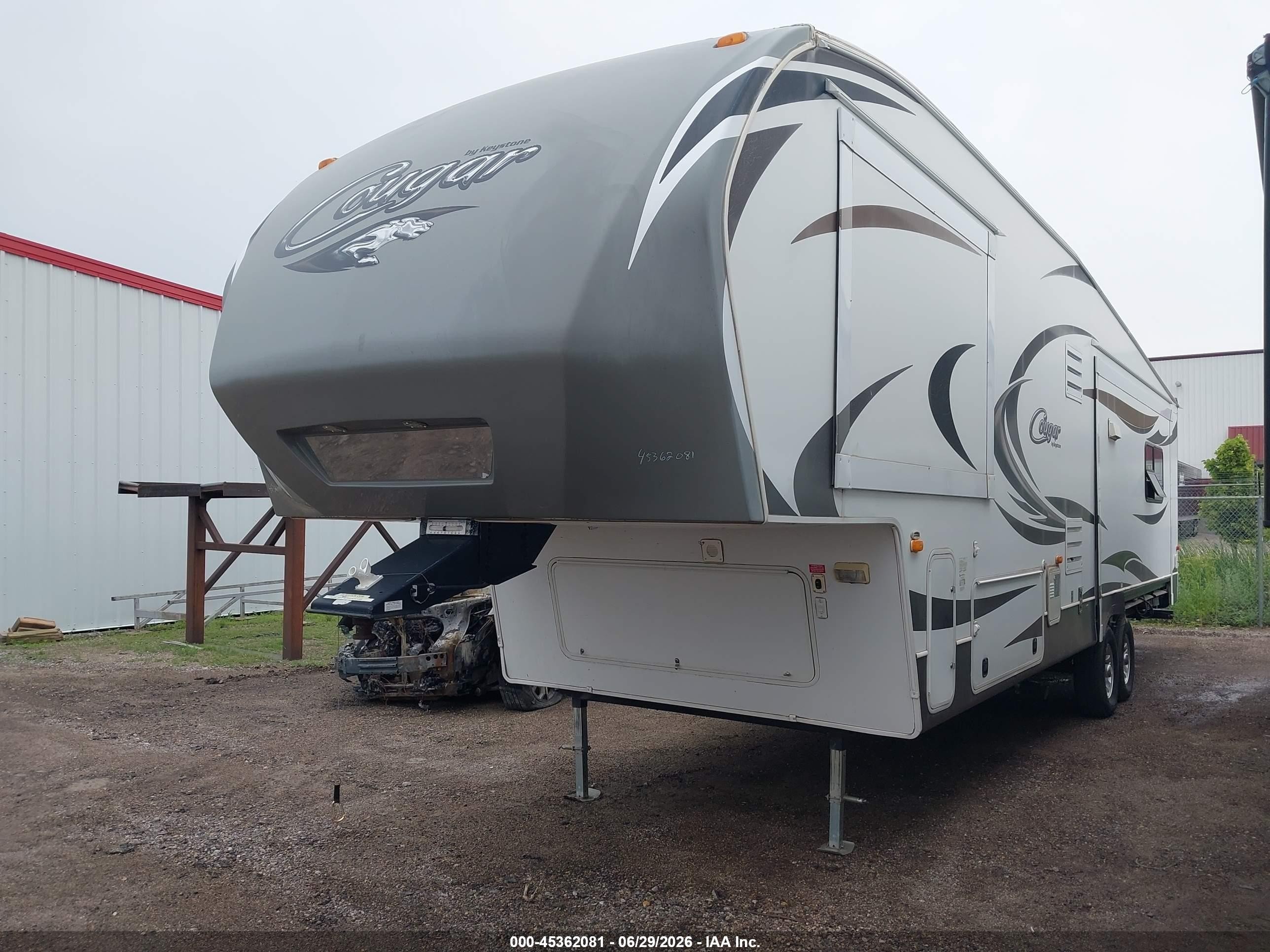 2012 Keystone Rv Cougar VIN 4YDF3272XC2504968 IAAI salvage auction — Storm Damage, Clear (North Dakota), sold $2,550 on 2026-09-30 (photo 2)
