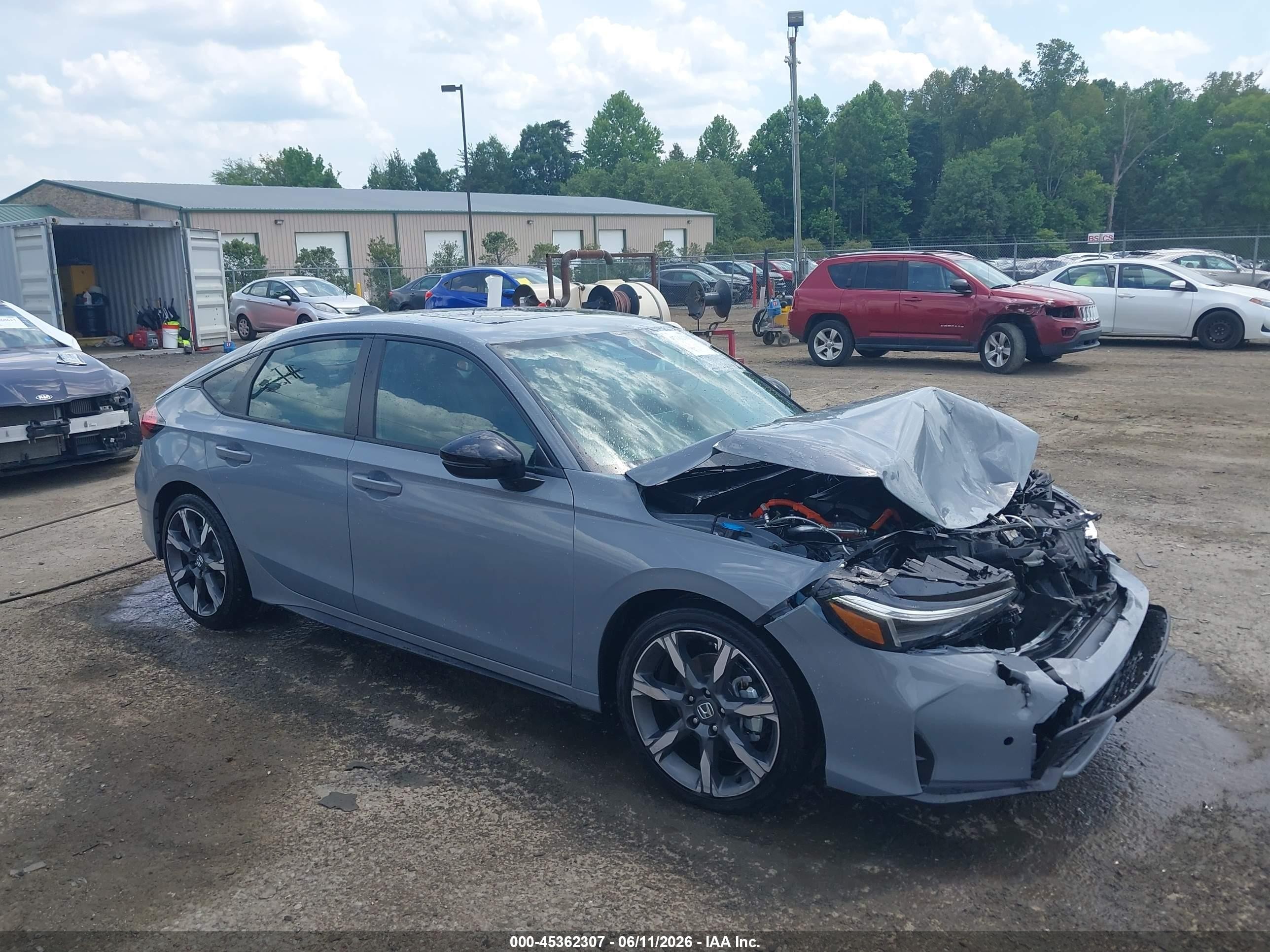 2026 Honda Civic Hybrid VIN 19XFL4H99TE009934 — IAAI salvage auction photo