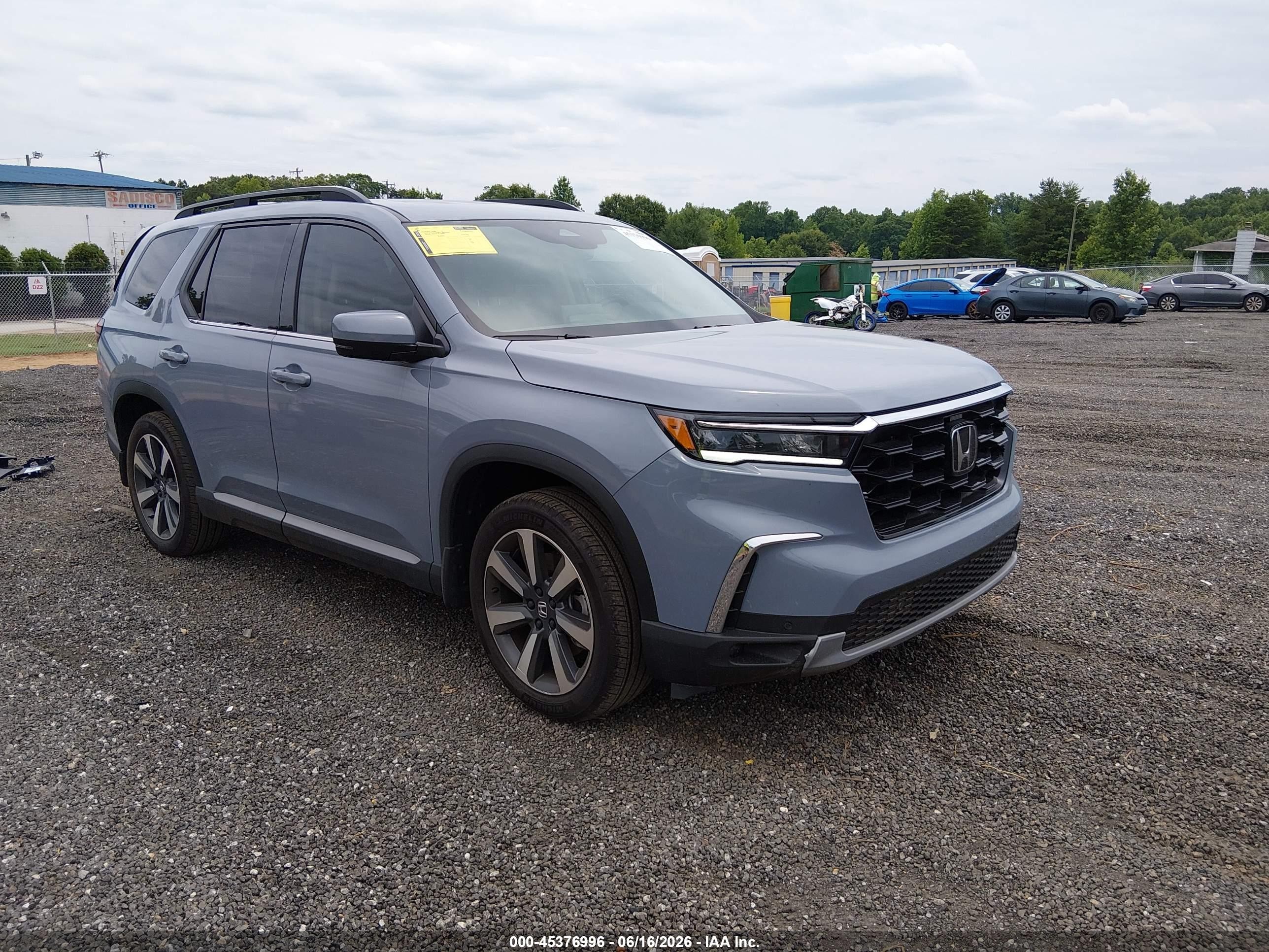 2025 Honda Pilot VIN 5FNYG2H77SB040978 — IAAI salvage auction photo
