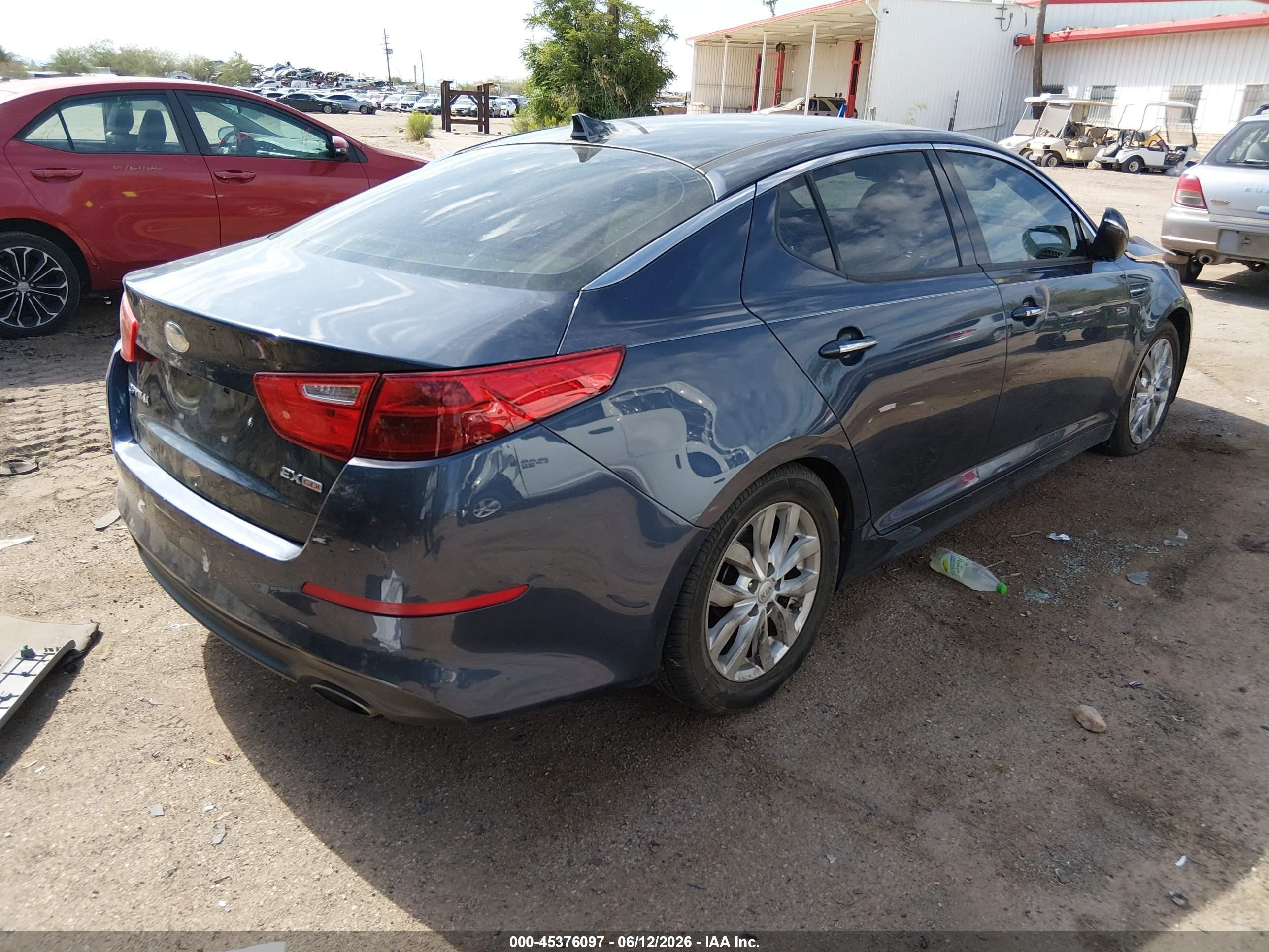 2015 Kia Optima VIN 5XXGN4A79FG384502 IAAI salvage auction — Unknown, Salvage (Arizona), sold $975 on 2026-07-09 (photo 4)
