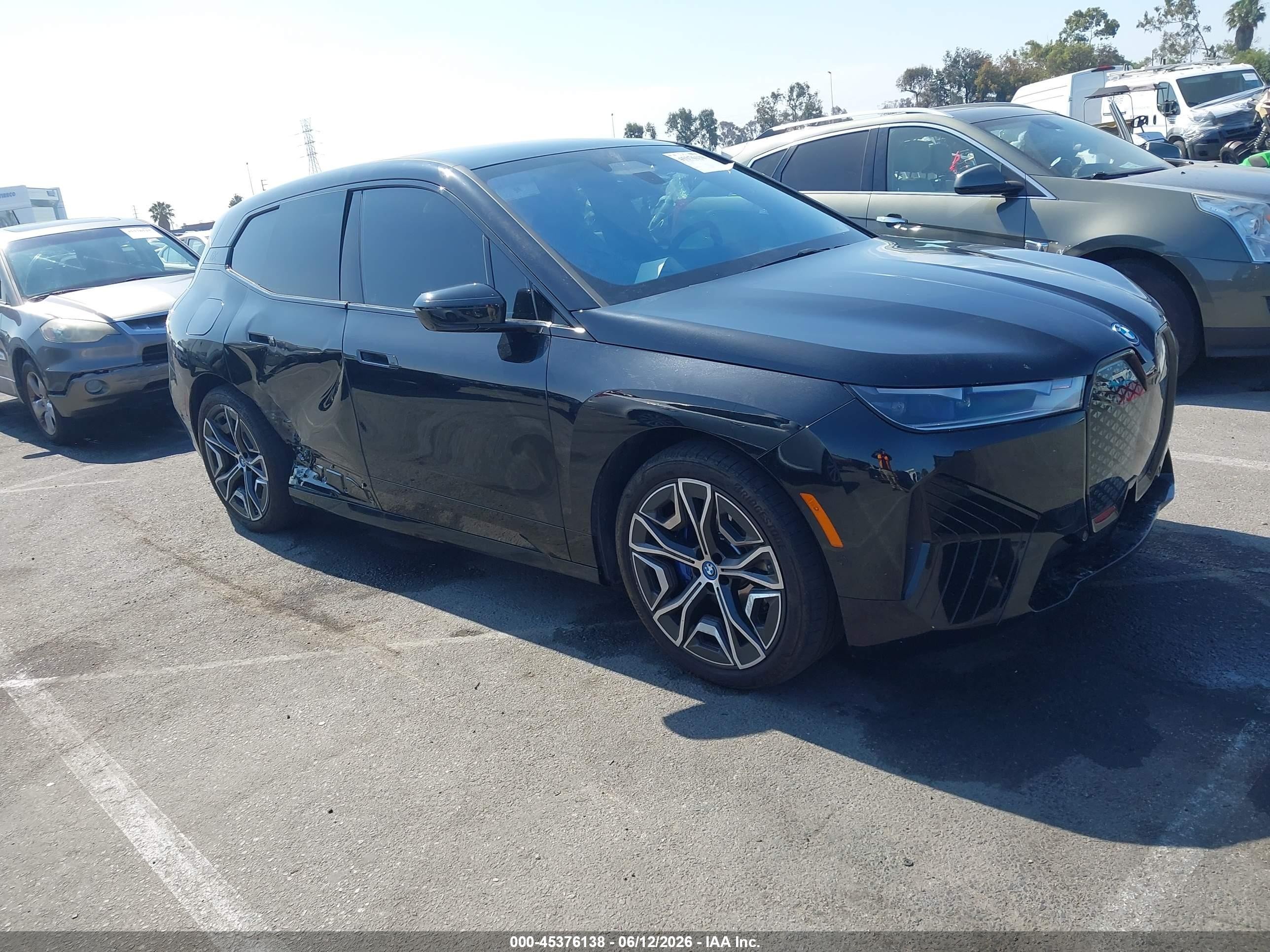 2025 BMW iX VIN WB523CF06SCT92553 — IAAI salvage auction photo