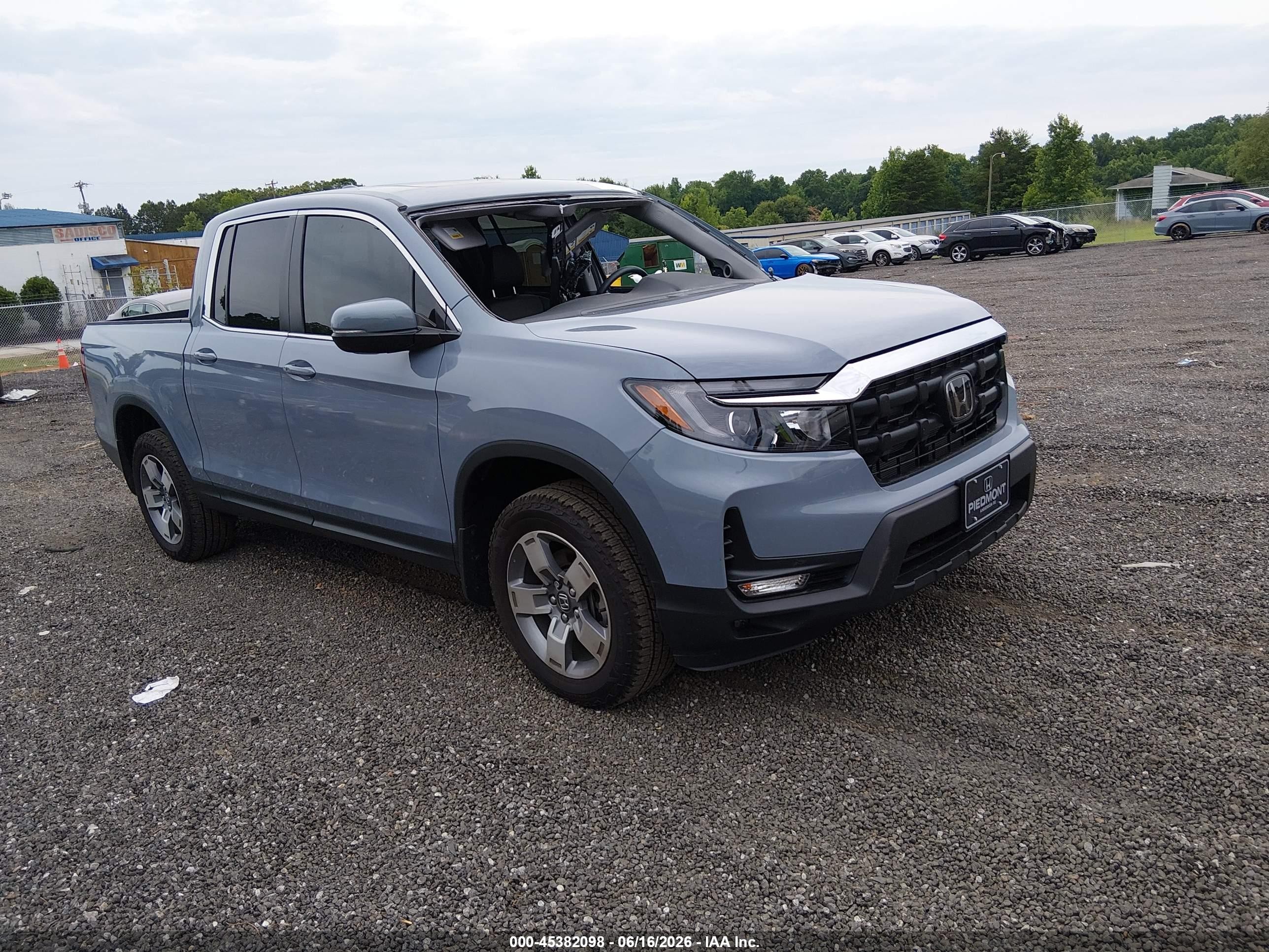 2026 Honda Ridgeline VIN 5FPYK3F56TB009106 — IAAI salvage auction photo