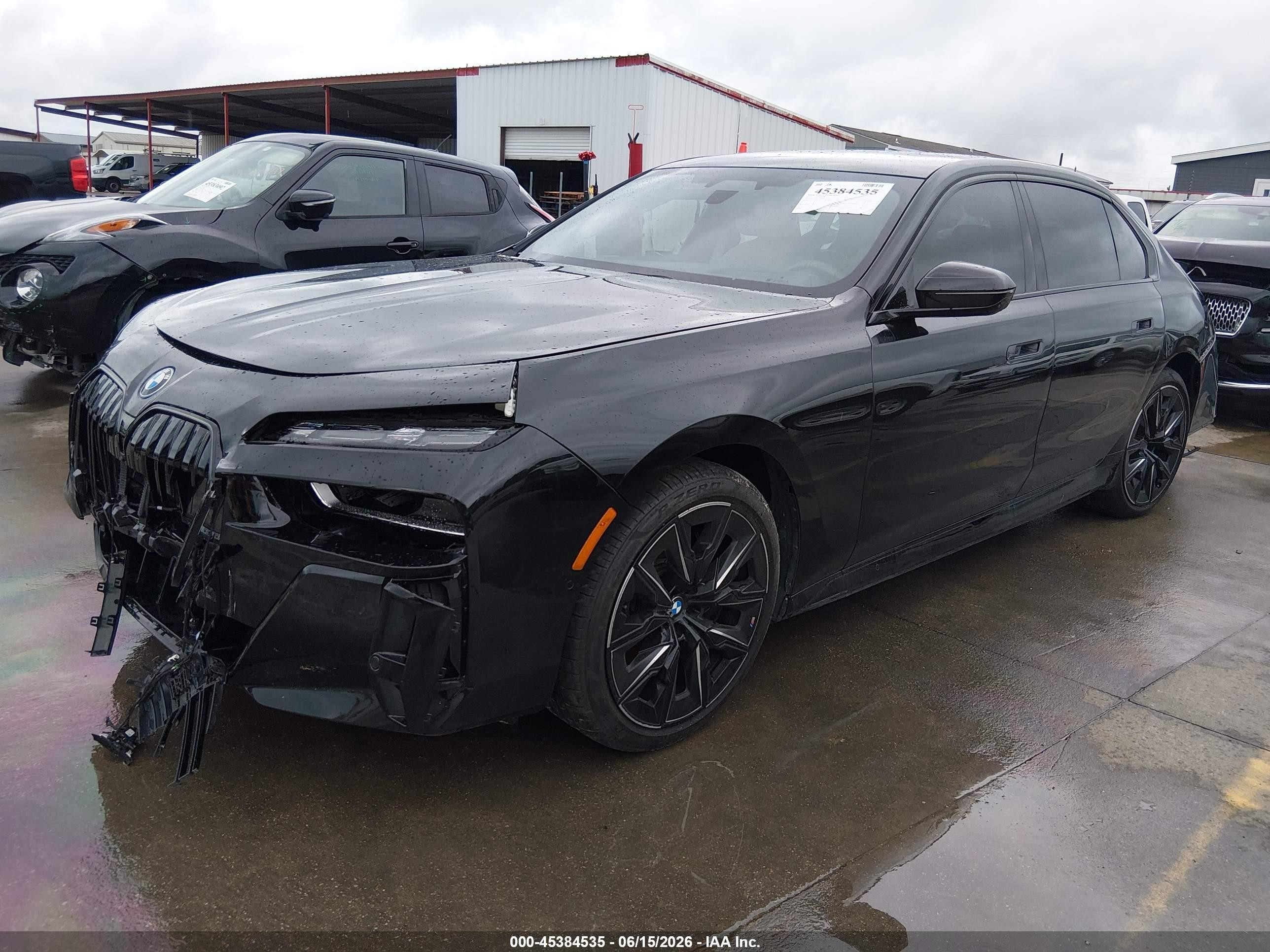 2024 BMW I7 VIN WBY43EJ02RCR08173 IAAI salvage auction — Front & Rear, Original (Texas), sold $19,125 on 2026-09-09 (photo 2)