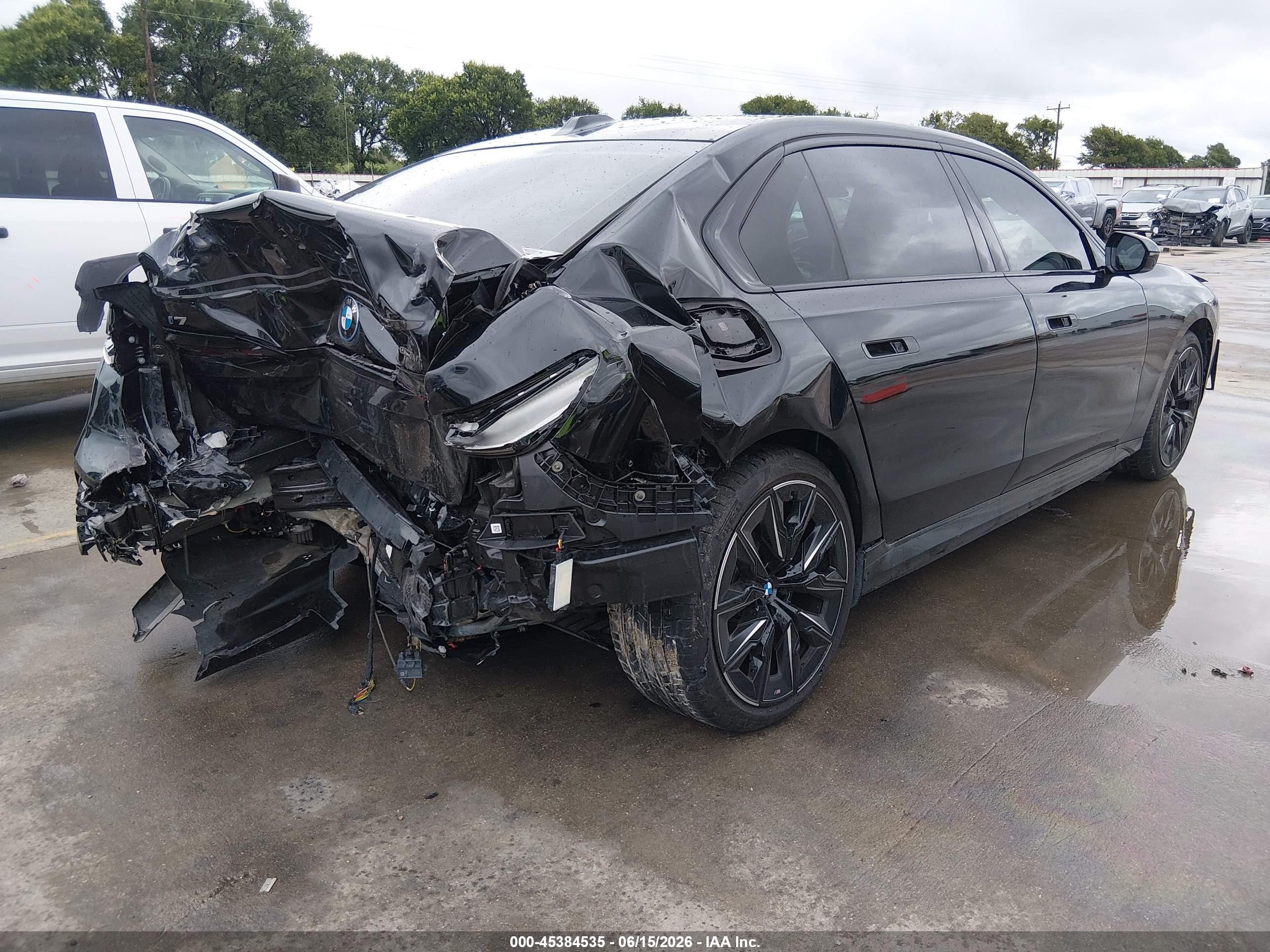 2024 BMW I7 VIN WBY43EJ02RCR08173 IAAI salvage auction — Front & Rear, Original (Texas), sold $19,125 on 2026-09-09 (photo 4)