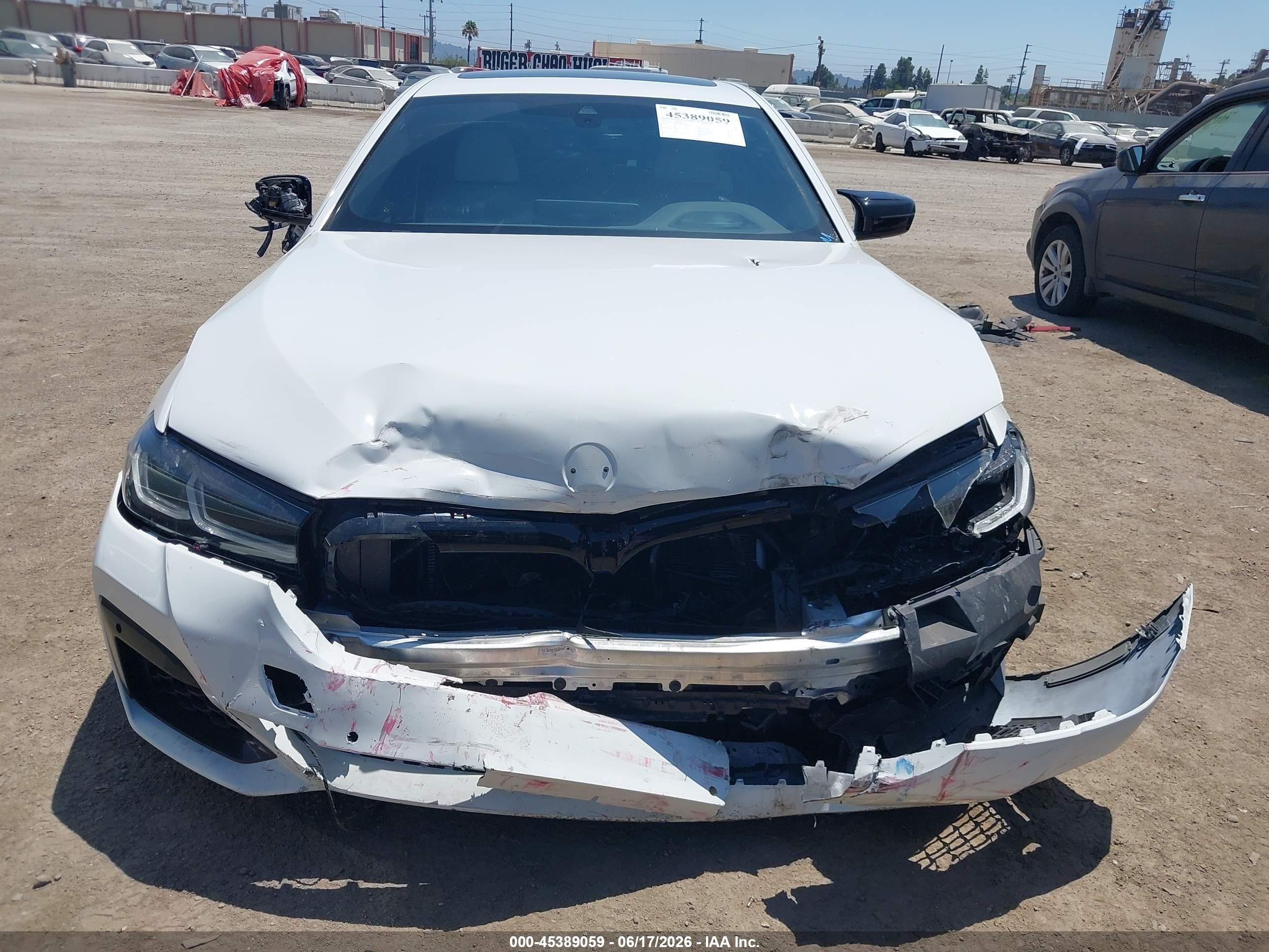 2022 BMW VIN WBA13BK05NCJ62066 IAAI salvage auction — Front & Rear, Salvage (California), sold $12,750 on 2026-09-09 (photo 6)