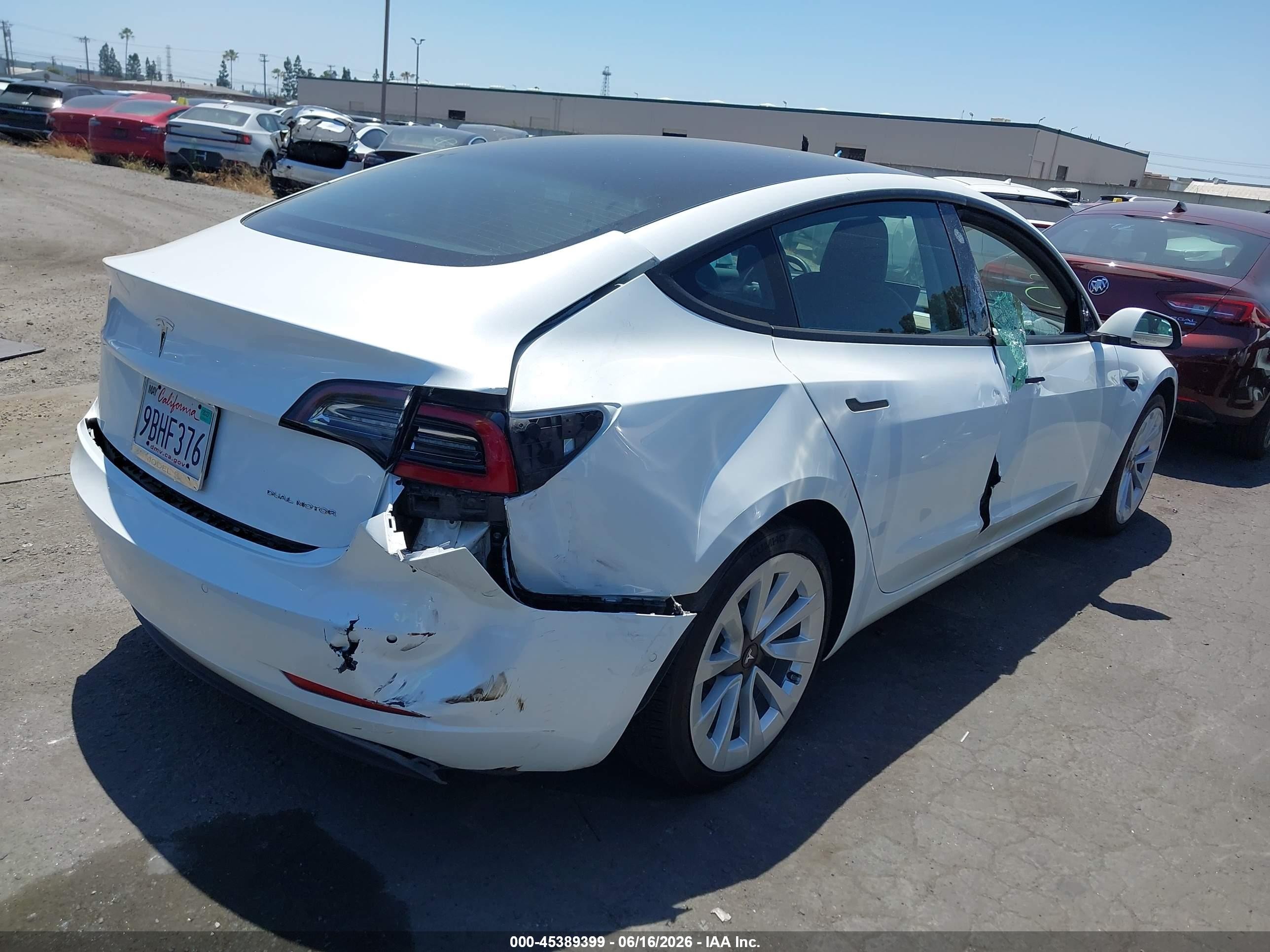 2022 Tesla Model 3 VIN 5YJ3E1EBXNF246660 IAAI salvage auction — Rear End, Salvage Certificate (California), sold $6,600 on 2026-07-12 (photo 4)