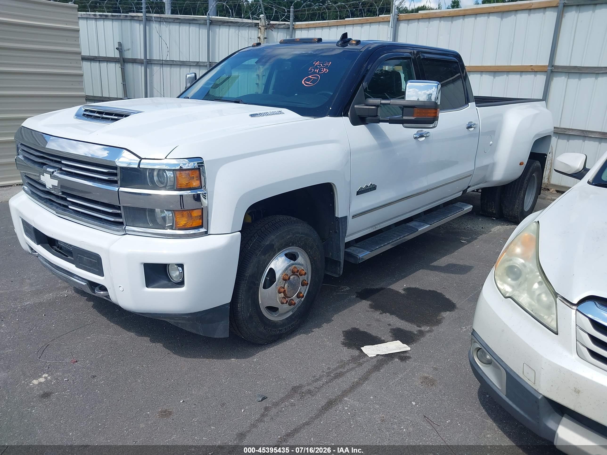 2017 Chevrolet Silverado VIN 1GC4K1EY3HF209869 IAAI salvage auction — Front & Rear, Salvage (California), sold $21,500 on 2026-07-18 (photo 2)