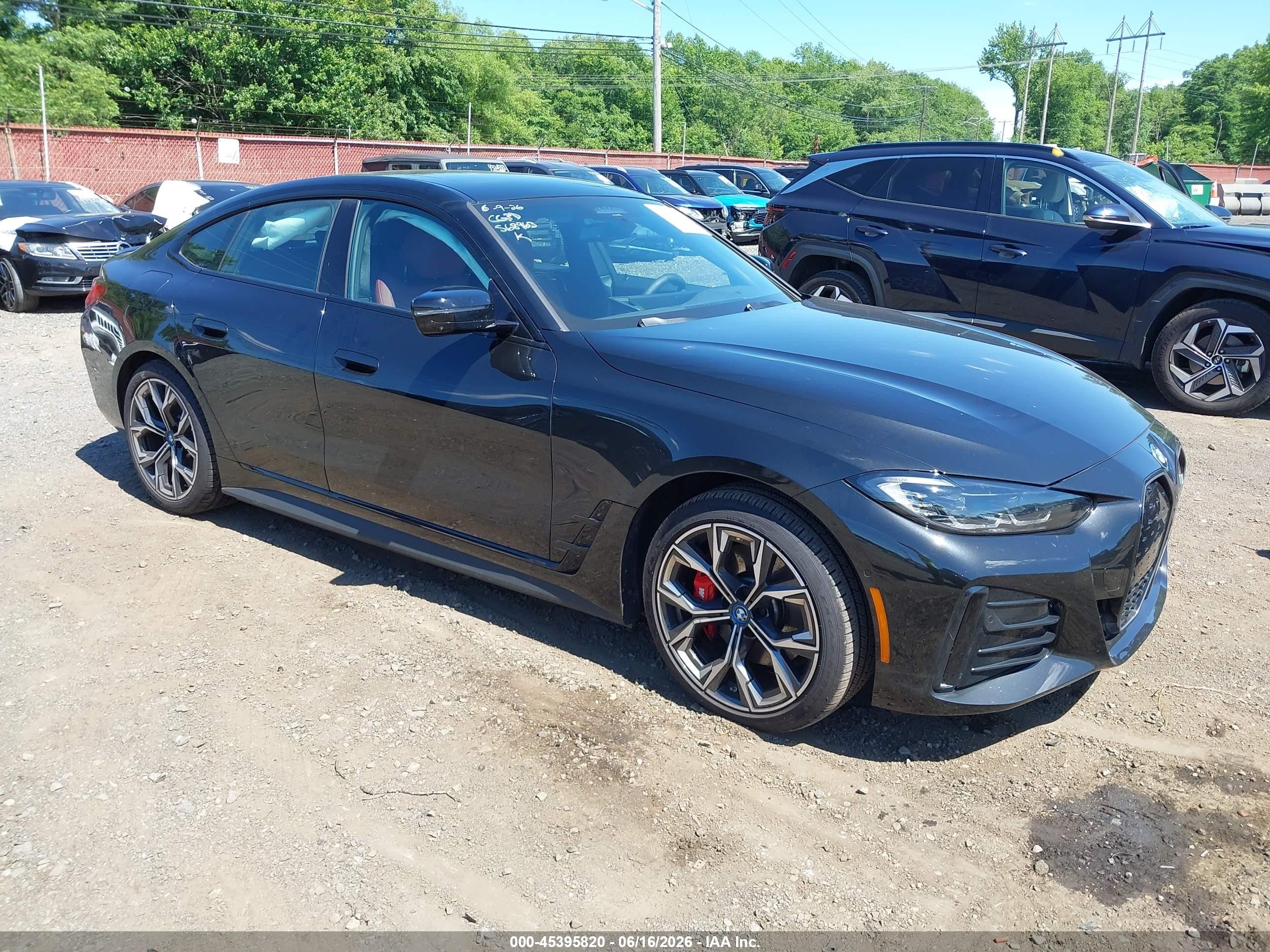 2024 BMW i4 VIN WBY73AW00RFS68963 — IAAI salvage auction photo
