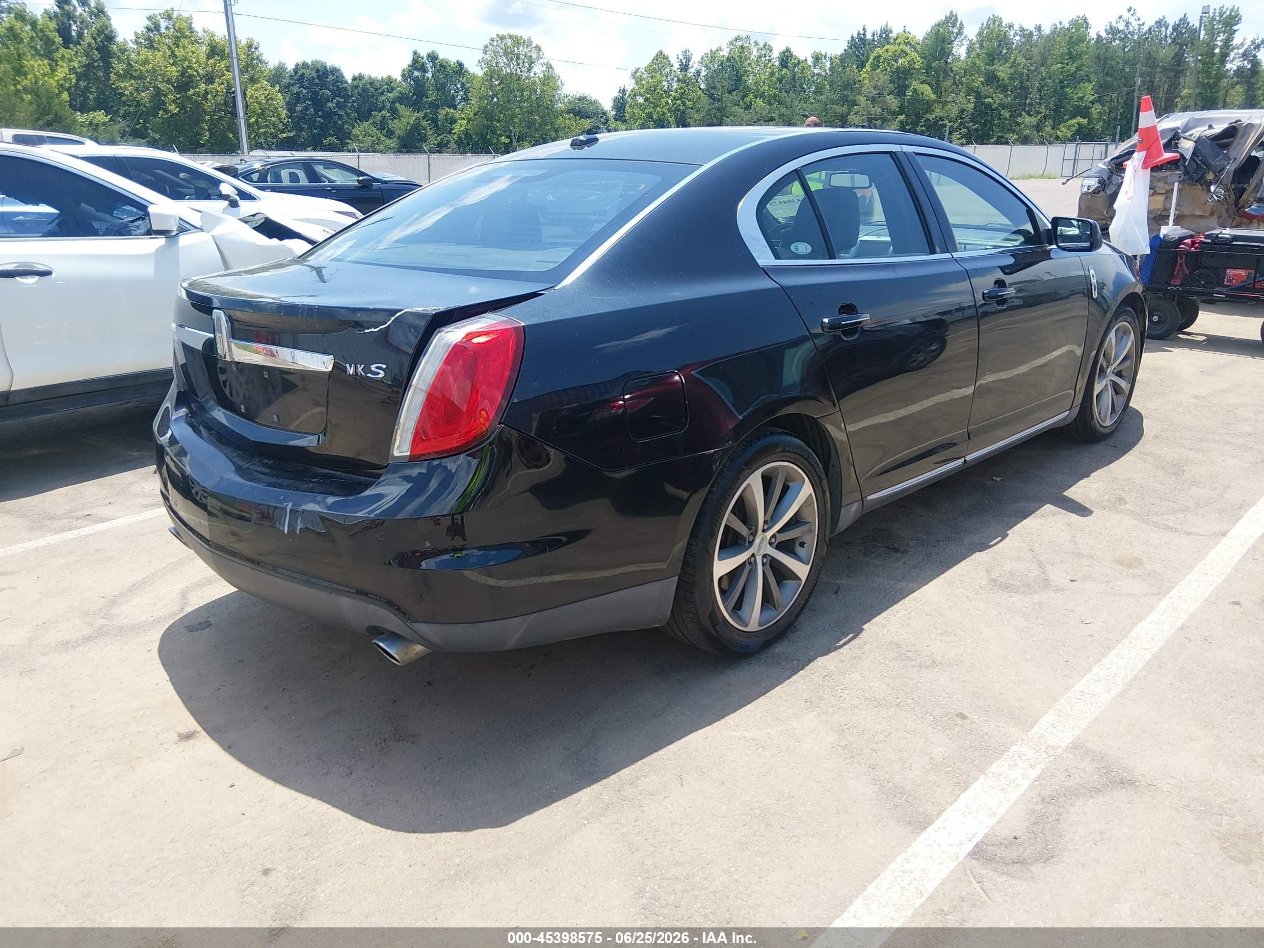 2011 Lincoln Mks VIN 1LNHL9DRXBG606824 IAAI salvage auction — Rear End, Salvage (Mississippi), sold $1,300 on 2026-09-23 (photo 4)