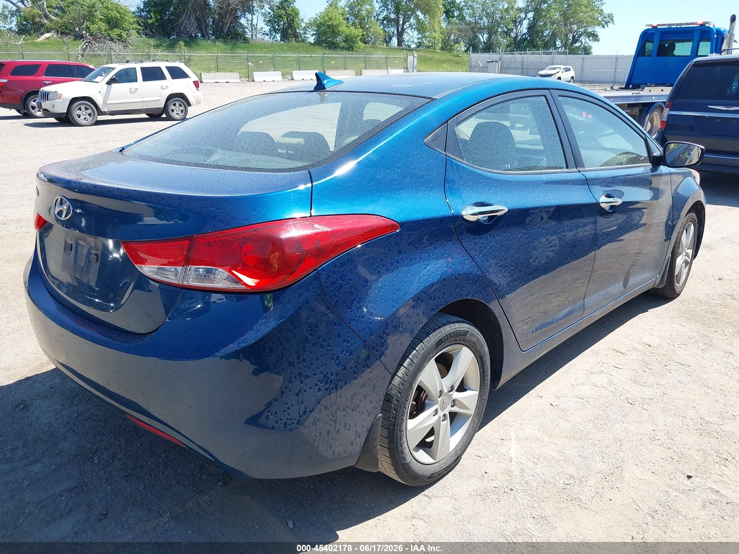 2013 Hyundai Elantra VIN KMHDH4AE0DU990184 IAAI salvage auction — Rear End, Certificate Of Title (Nebraska), sold $775 on 2026-07-12 (photo 4)