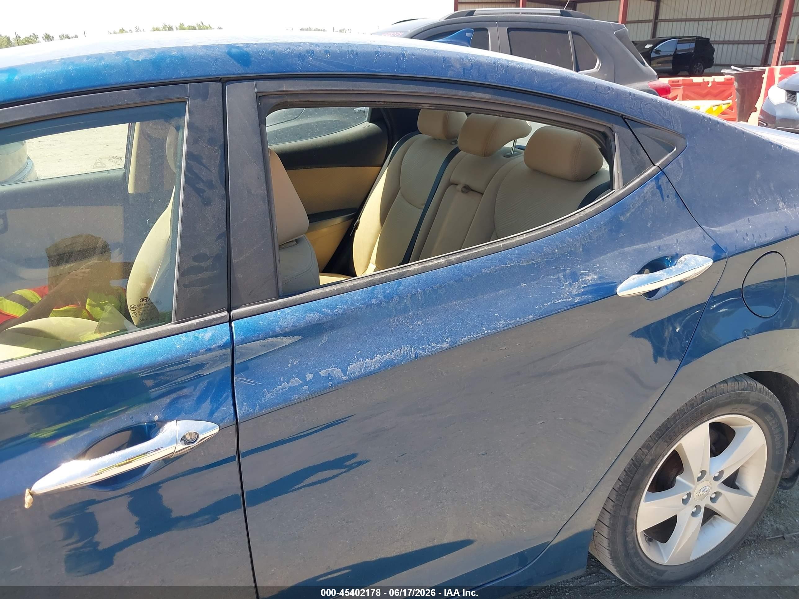 2013 Hyundai Elantra VIN KMHDH4AE0DU990184 IAAI salvage auction — Rear End, Certificate Of Title (Nebraska), sold $775 on 2026-07-12 (photo 6)