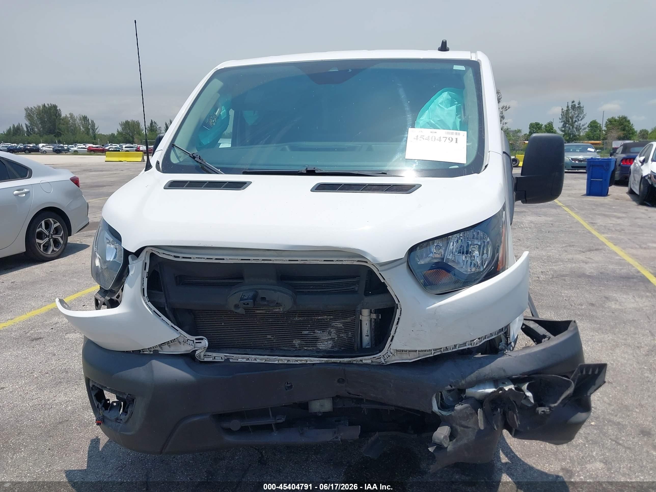 2020 Ford Transit-150 VIN 1FTYE1Y80LKA19404 IAAI salvage auction — Front End, Rebuildable (Florida), sold $5,200 on 2026-09-24 (photo 6)