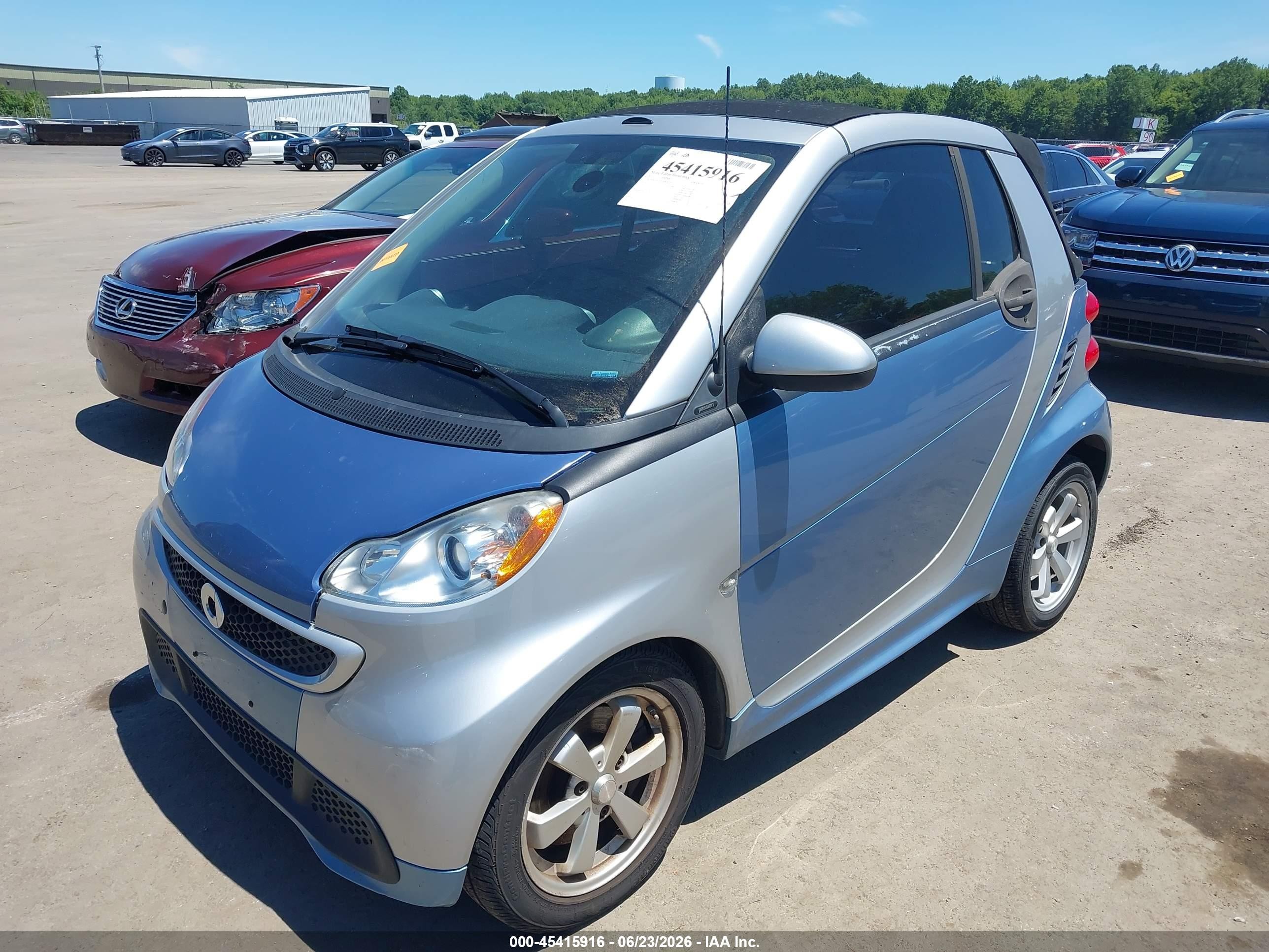 2013 Smart Fortwo VIN WMEEK3BA9DK582702 IAAI salvage auction — Side, Salvage (Ohio), sold $1,300 on 2026-09-23 (photo 2)