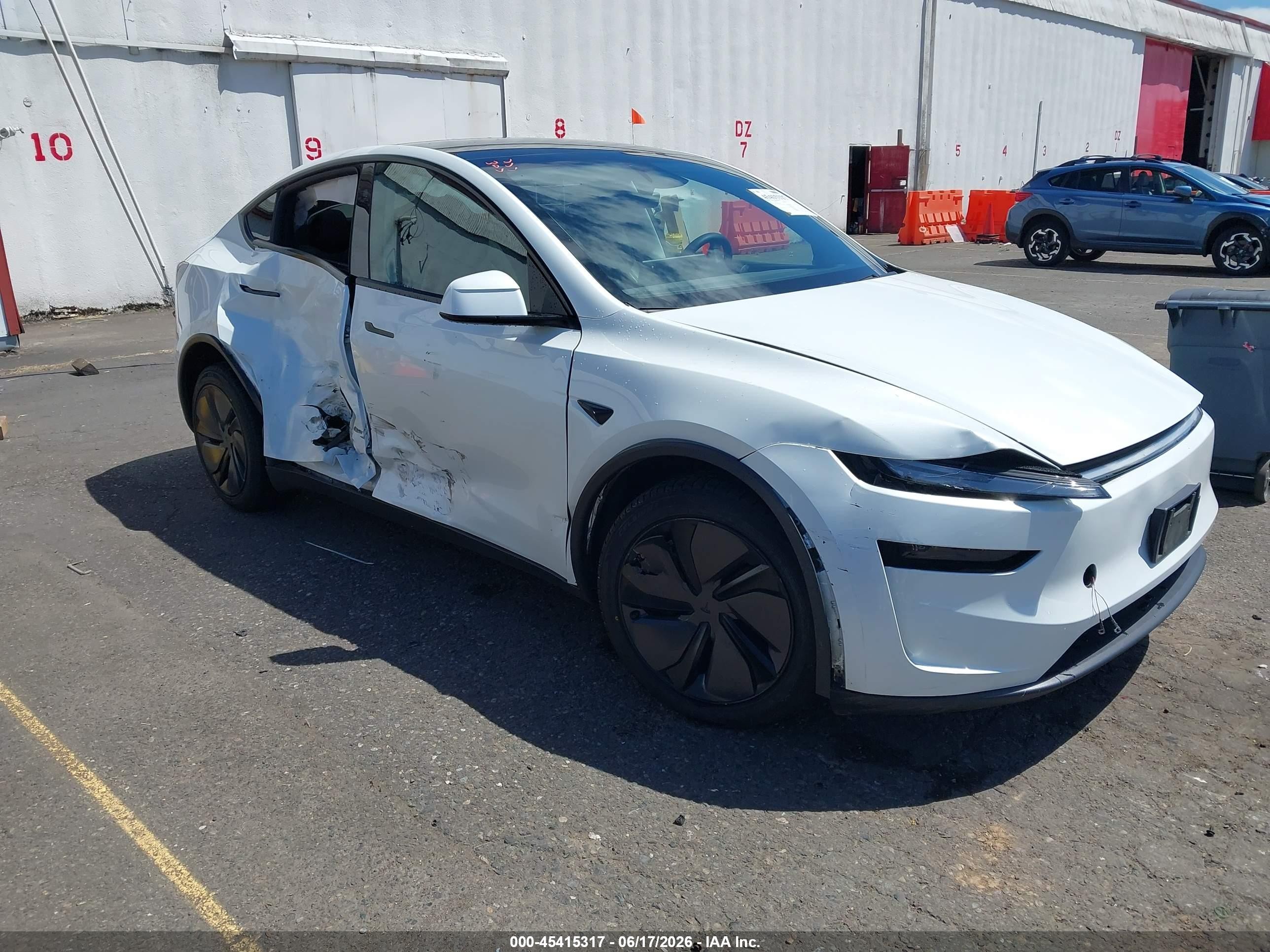 2026 Tesla Model Y VIN 7SAYGDEE8TF338734 — IAAI salvage auction photo
