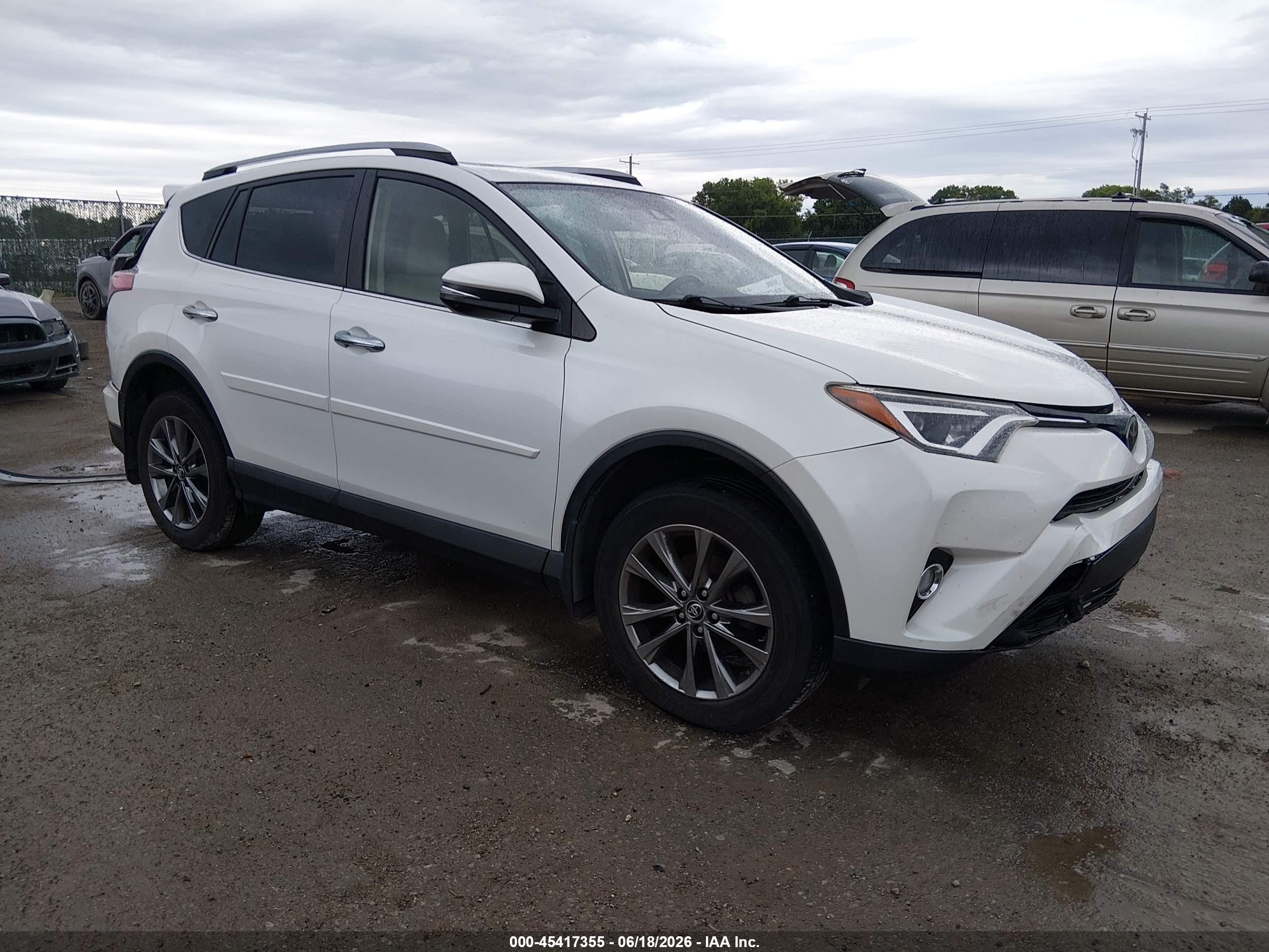 2018 Toyota RAV4 VIN JTMDFREVXJJ219682 — IAAI salvage auction photo