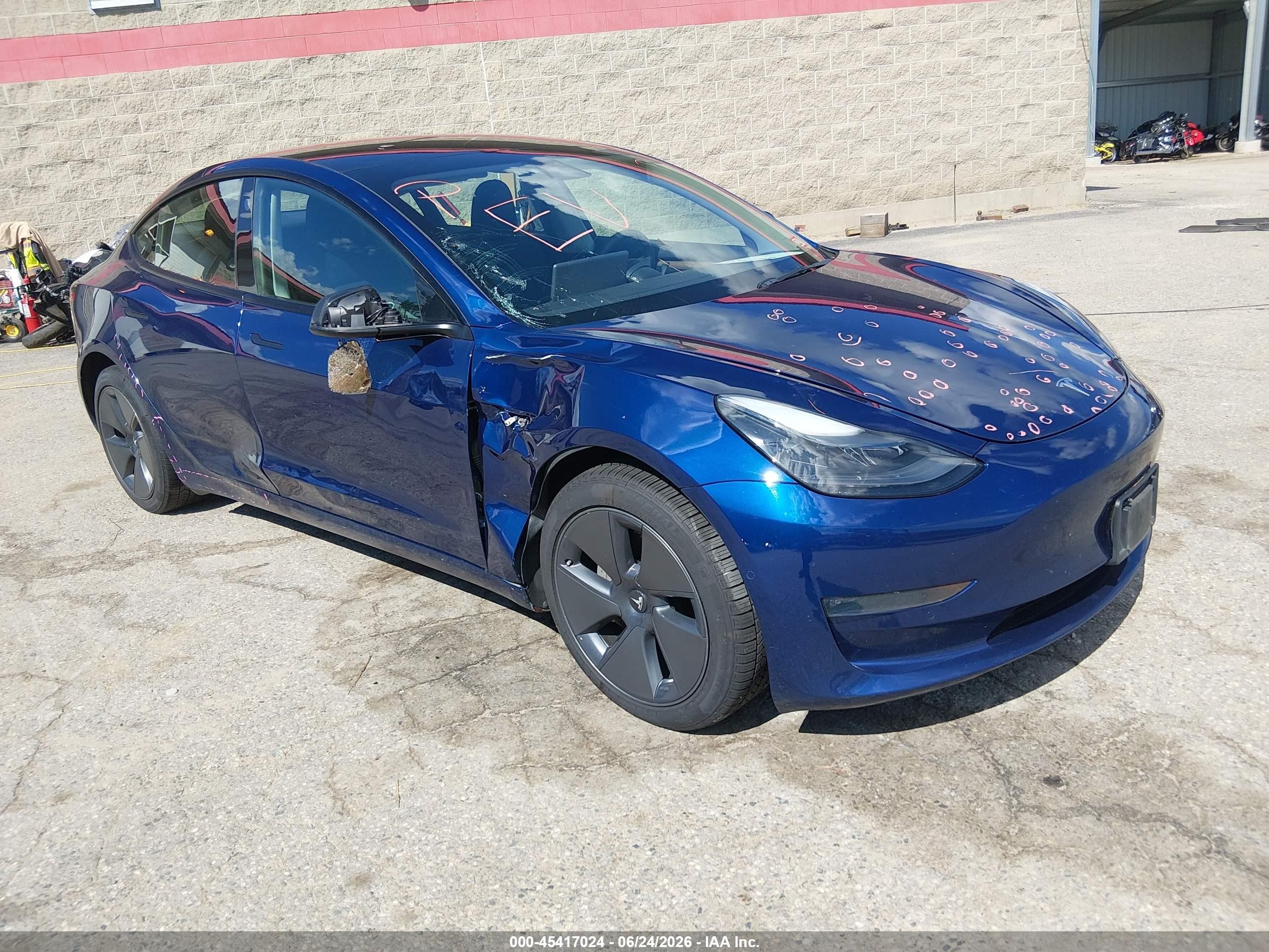 2022 Tesla Model 3 VIN 5YJ3E1EB8NF159324 — IAAI salvage auction photo