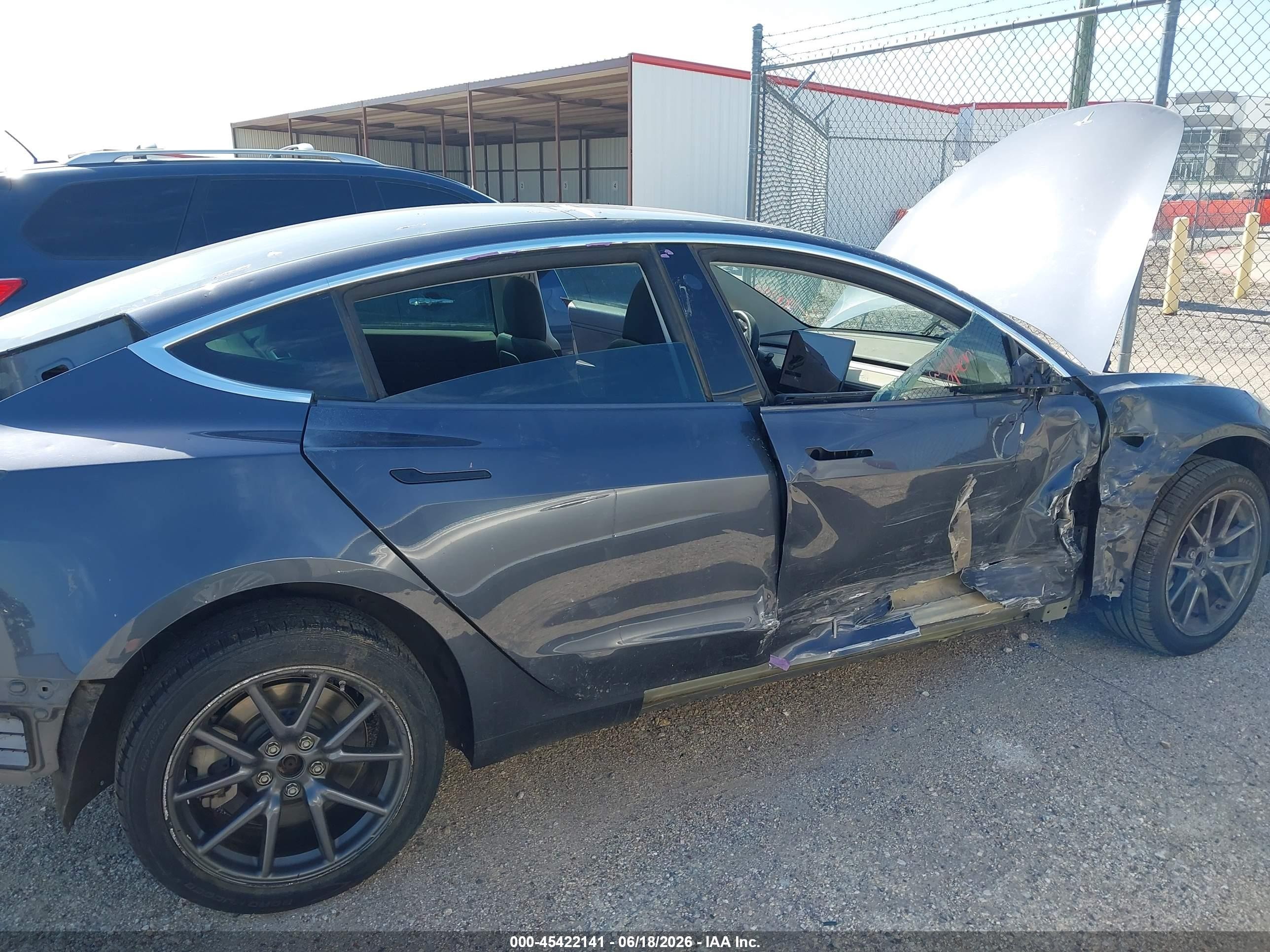 2019 Tesla Model 3 VIN 5YJ3E1EA8KF308141 IAAI salvage auction — Side, Original (Texas), sold $2,625 on 2026-06-30 (photo 6)