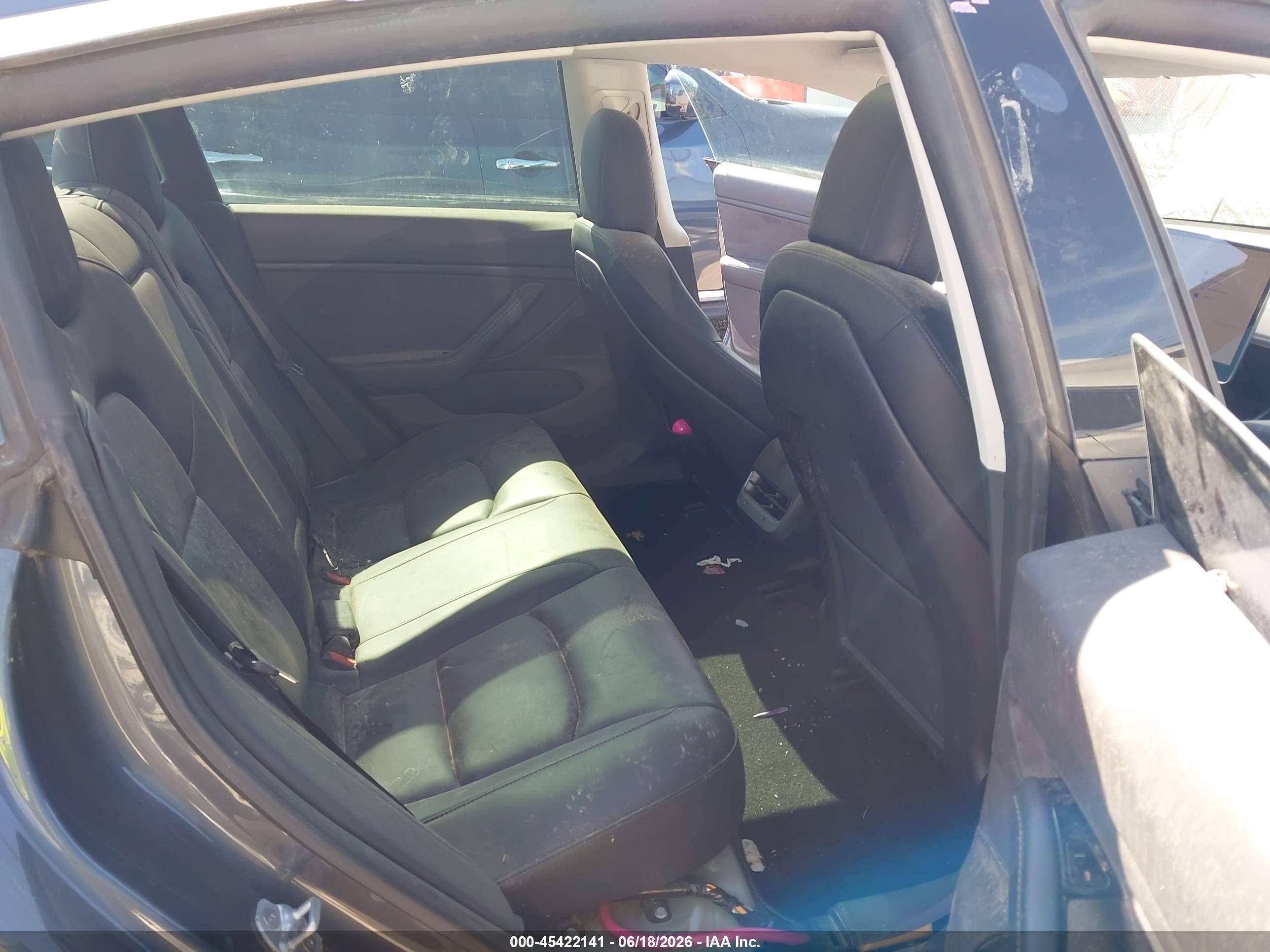 2019 Tesla Model 3 VIN 5YJ3E1EA8KF308141 IAAI salvage auction — Side, Original (Texas), sold $2,625 on 2026-06-30 (photo 8)