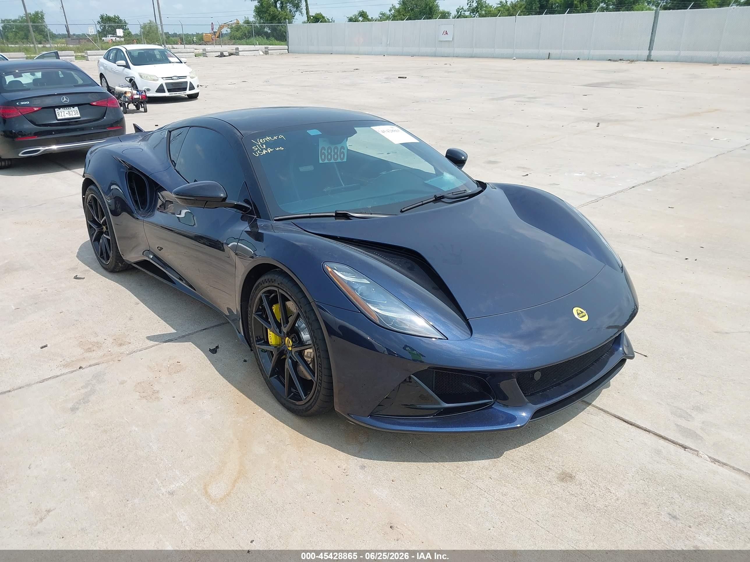 2024 Lotus Emira VIN SCCLEKAX1RHA13099 IAAI salvage auction — Rear End, Salvage (Texas), sold $51,000 on 2026-08-14 (photo 1)