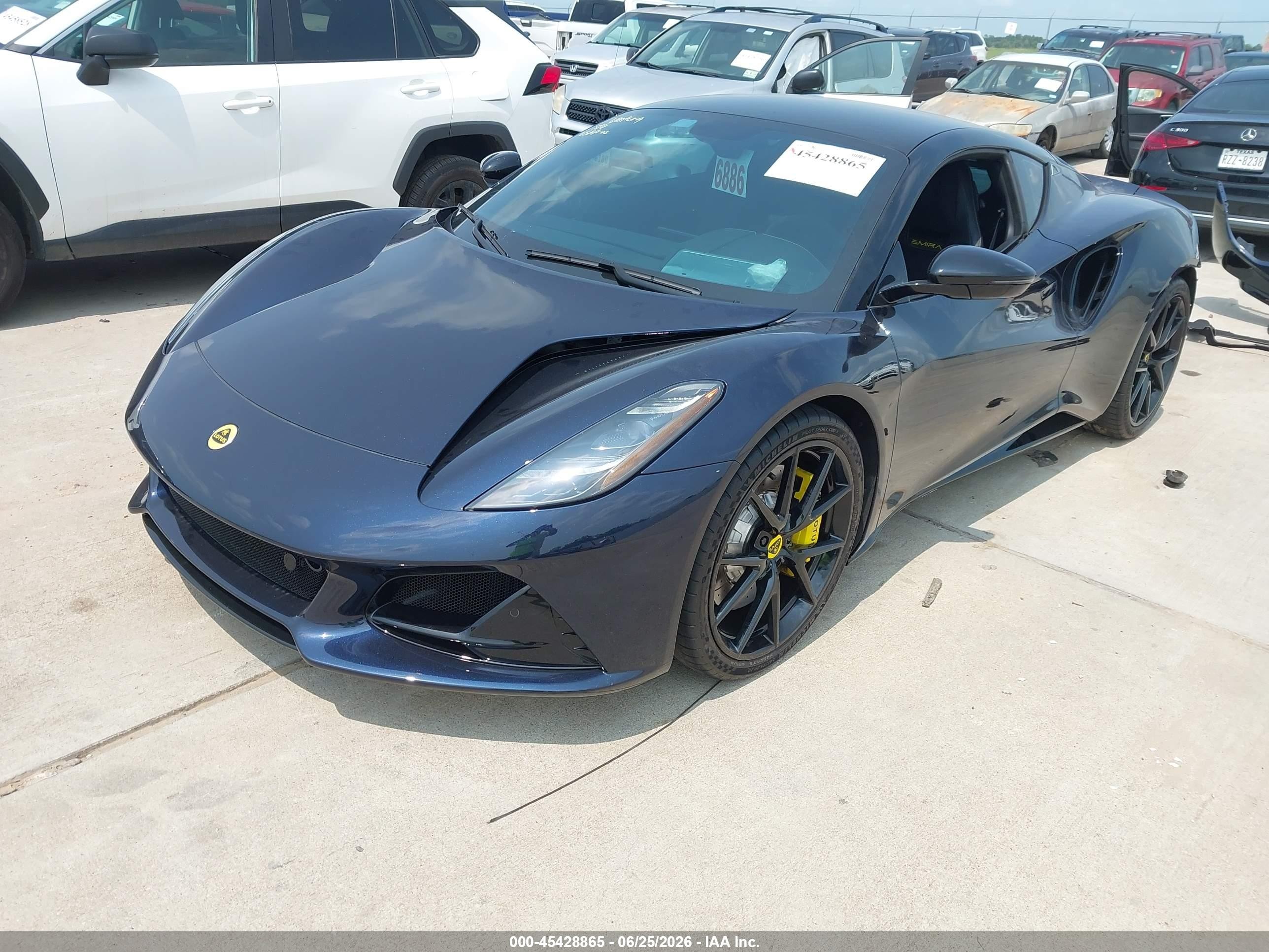 2024 Lotus Emira VIN SCCLEKAX1RHA13099 IAAI salvage auction — Rear End, Salvage (Texas), sold $51,000 on 2026-08-14 (photo 2)