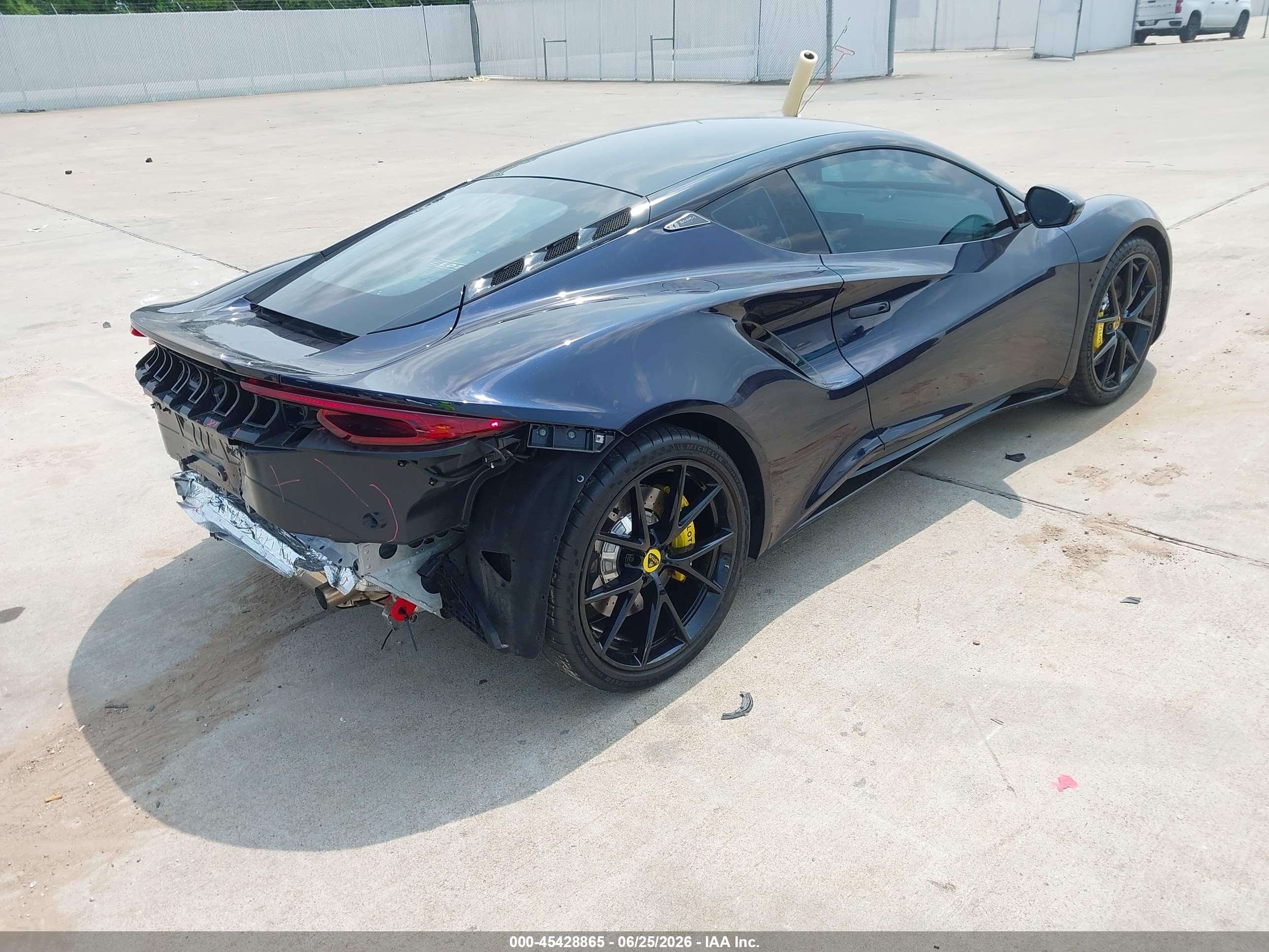 2024 Lotus Emira VIN SCCLEKAX1RHA13099 IAAI salvage auction — Rear End, Salvage (Texas), sold $51,000 on 2026-08-14 (photo 4)
