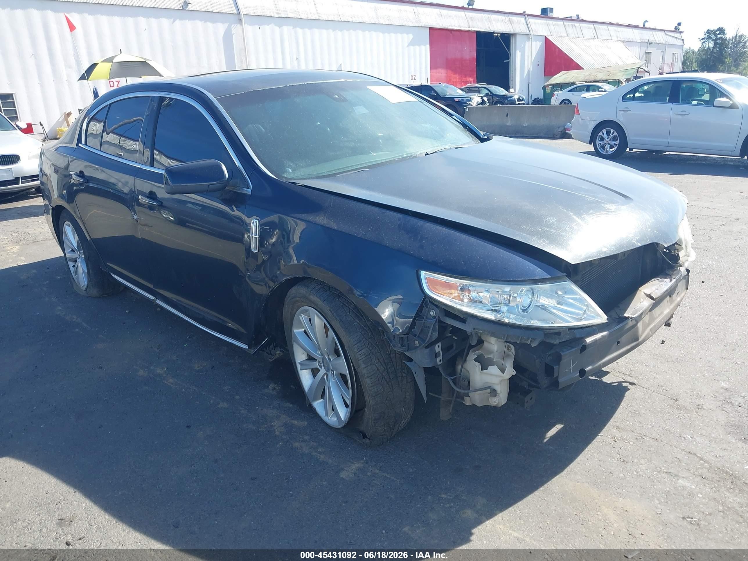 2009 Lincoln MKS VIN 1LNHM94RX9G608922 IAAI salvage auction — Front & Rear, Salvage (Oregon), sold $325 on 2026-07-09 (photo 1)