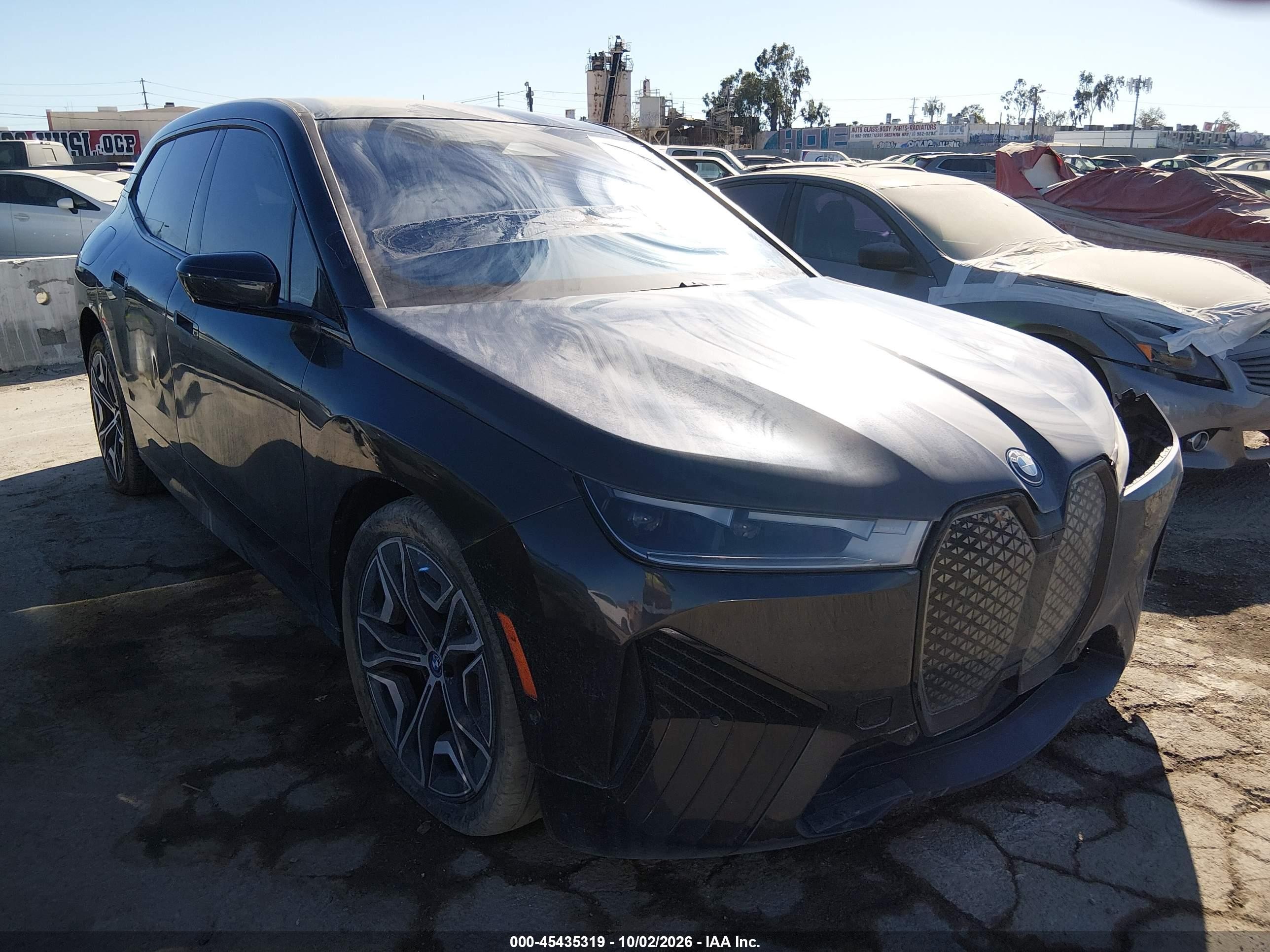 2024 BMW iX VIN WB523CF00RCR56045 — IAAI salvage auction photo