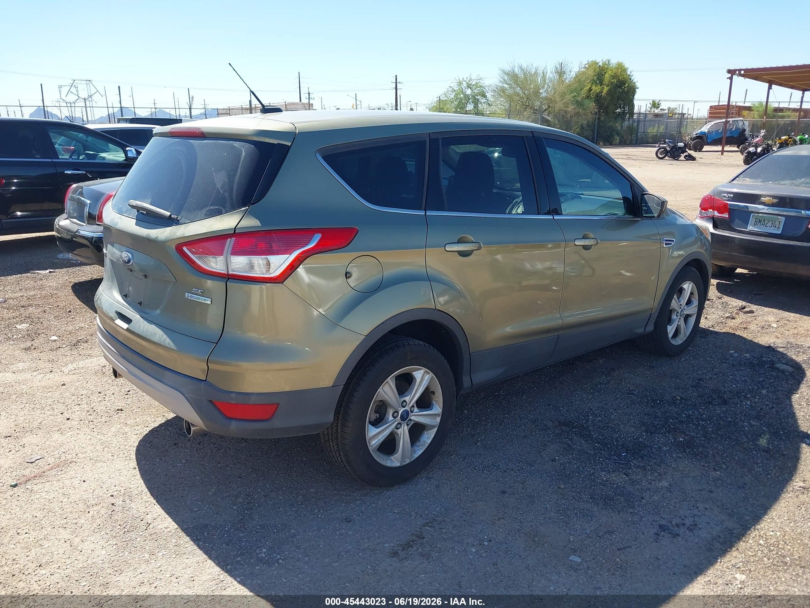2013 Ford Escape VIN 1FMCU0GX2DUB97025 IAAI salvage auction — Normal Wear, Clear-Dealer Only (Arizona), sold $800 on 2026-07-09 (photo 4)