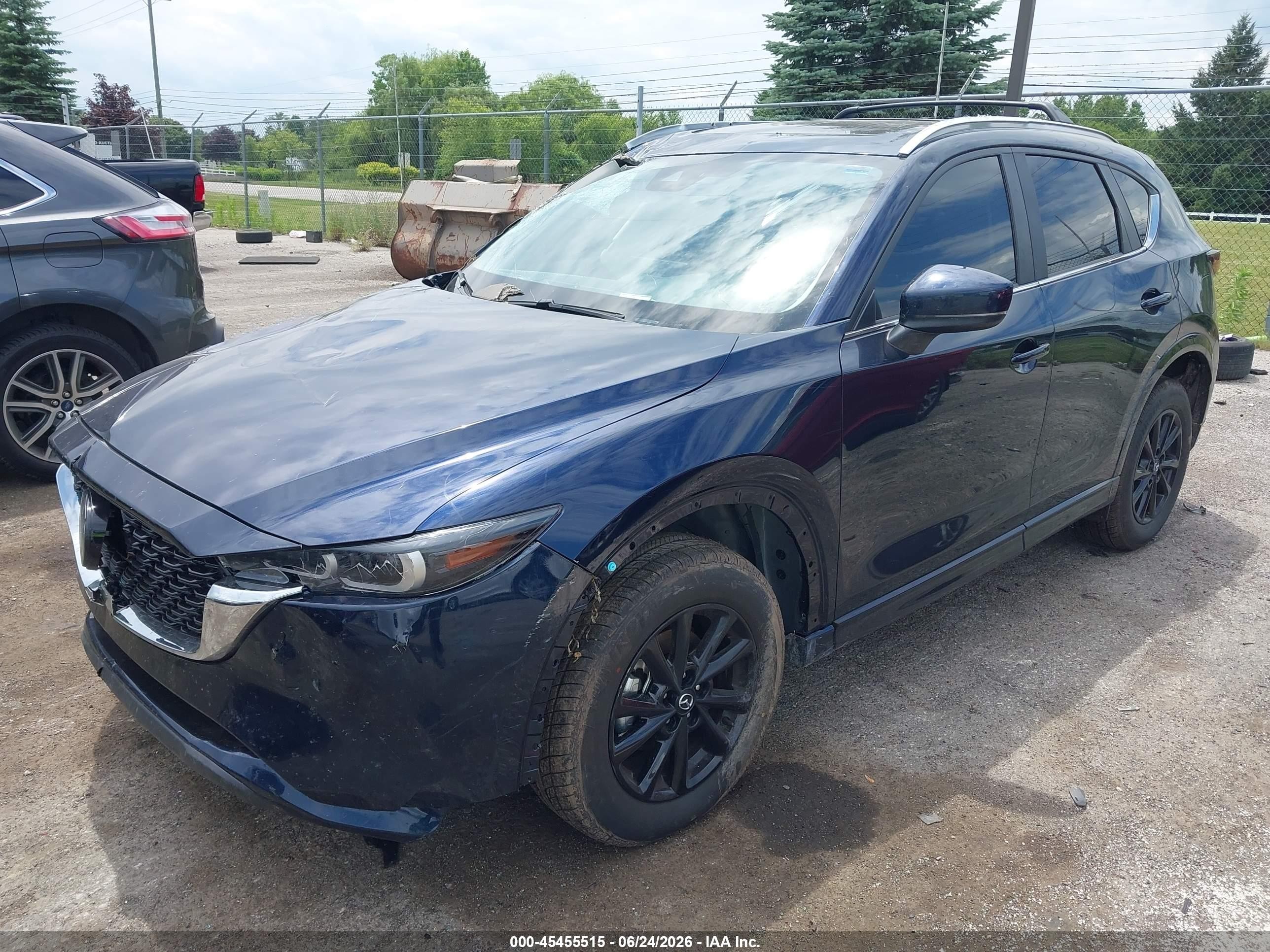 2024 Mazda Cx-5 VIN JM3KFBCL9R0435614 IAAI salvage auction — Side, Salvage (Florida), sold $5,400 on 2026-09-03 (photo 2)