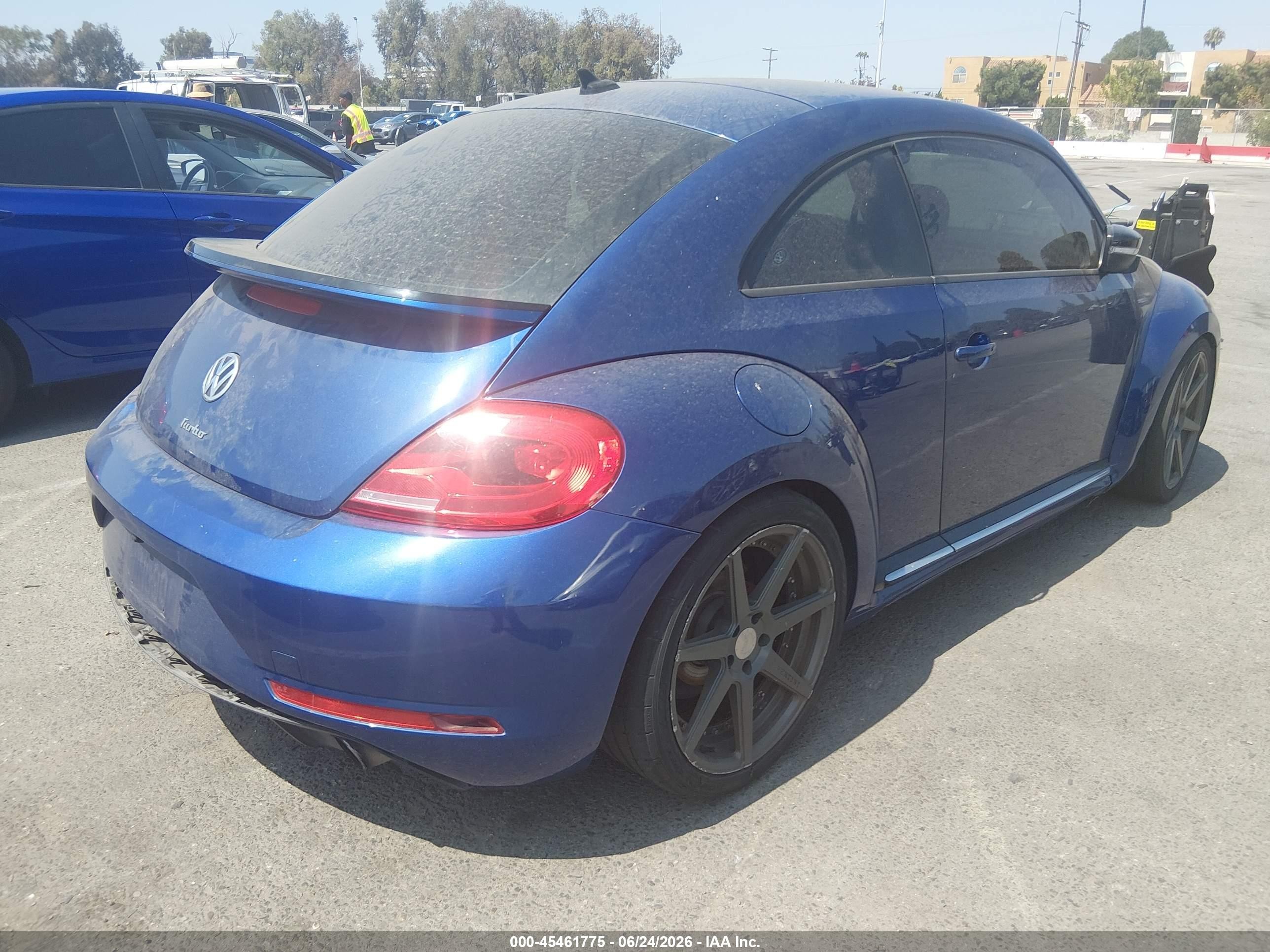 2014 Volkswagen Beetle VIN 3VWVT7AT4EM609639 IAAI salvage auction — Normal Wear, Clear - Dealer Only (California), sold $1,300 on 2026-07-02 (photo 4)