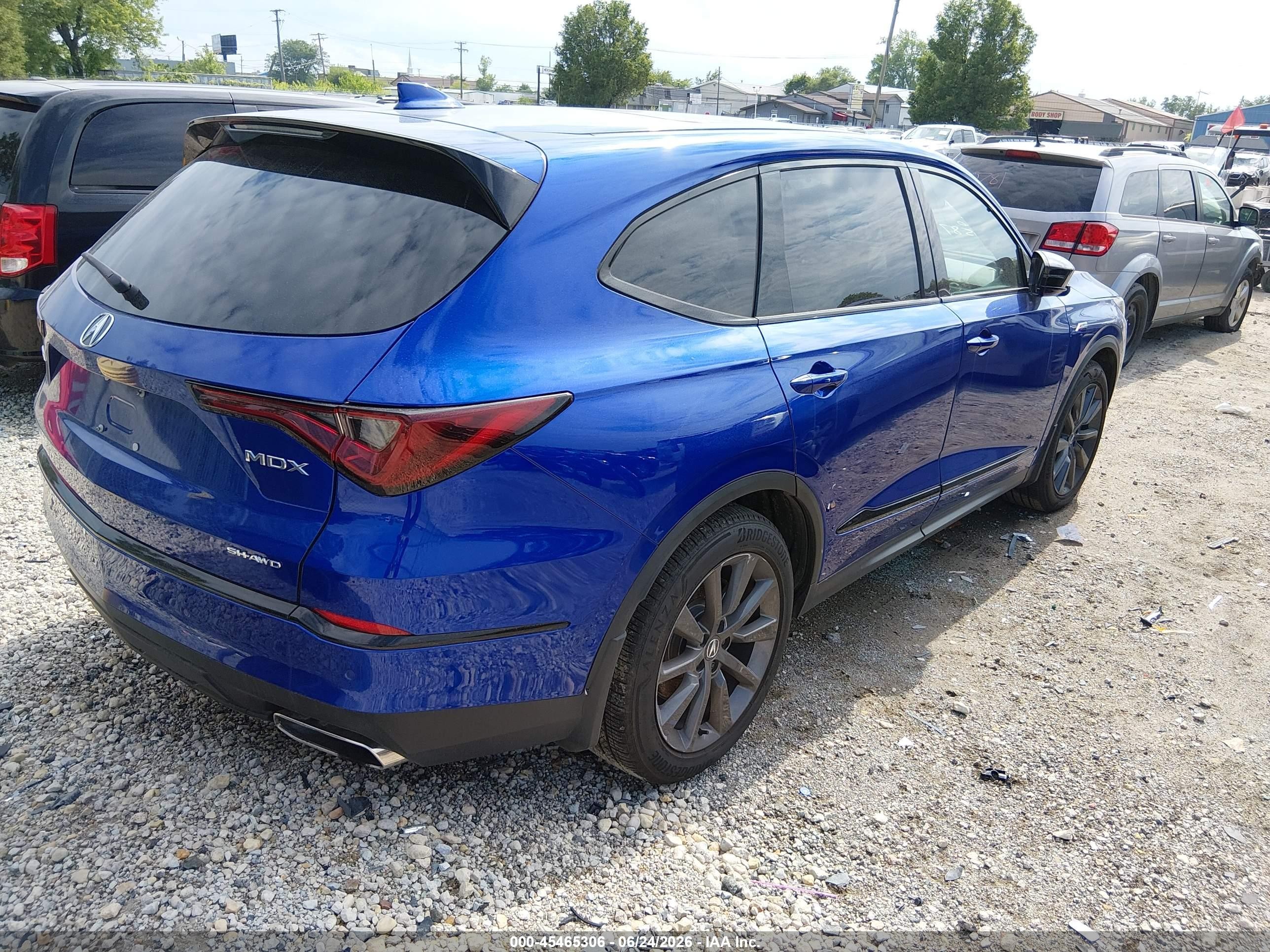 2025 Acura MDX VIN 5J8YE1H07SL025317 IAAI salvage auction — Side, Salvage (Illinois), sold $27,250 on 2026-09-02 (photo 4)