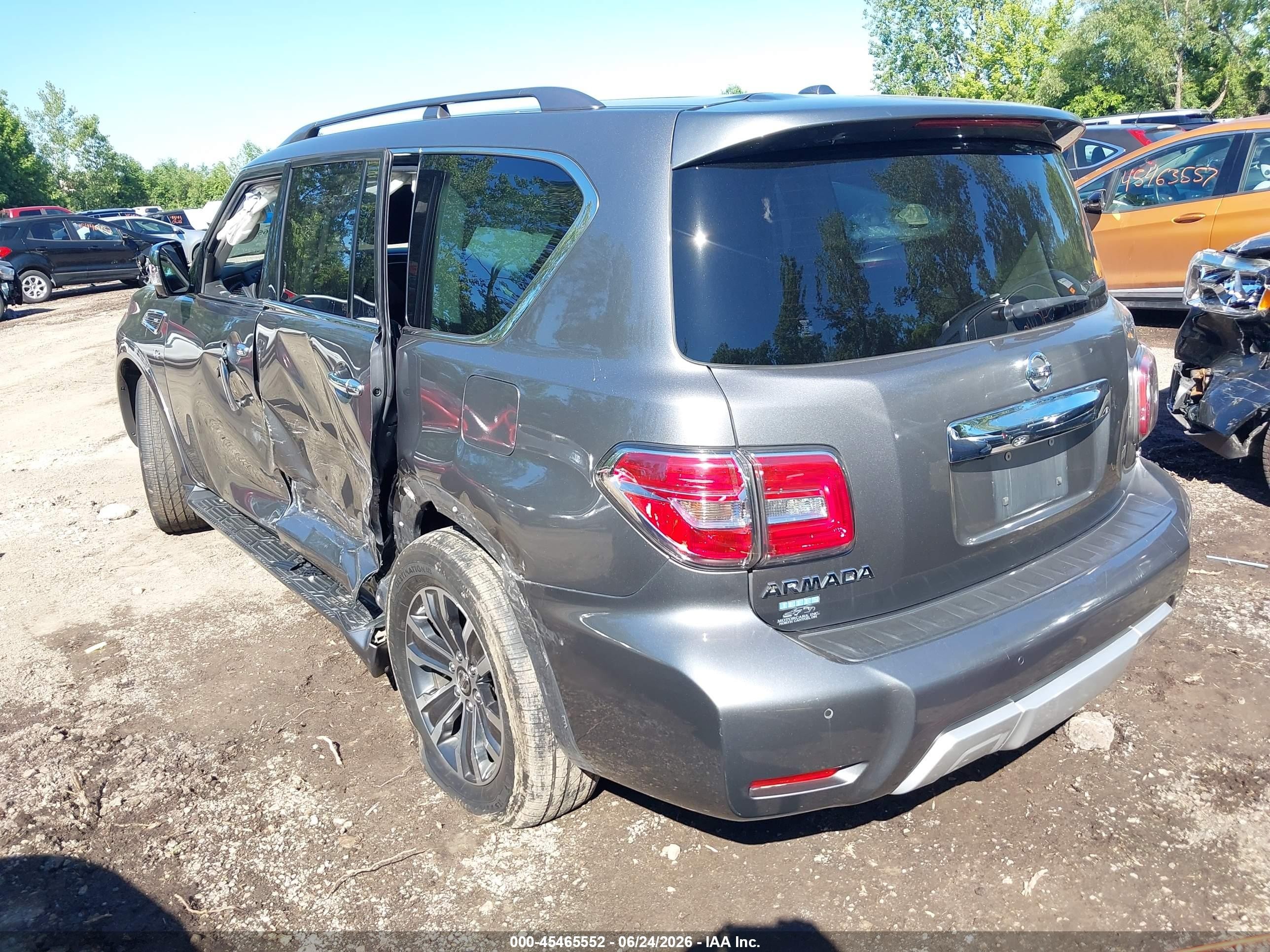 2018 Nissan Armada VIN JN8AY2NC1JX501875 IAAI salvage auction — Side, Salvage (Ohio), sold $5,700 on 2026-07-11 (photo 3)