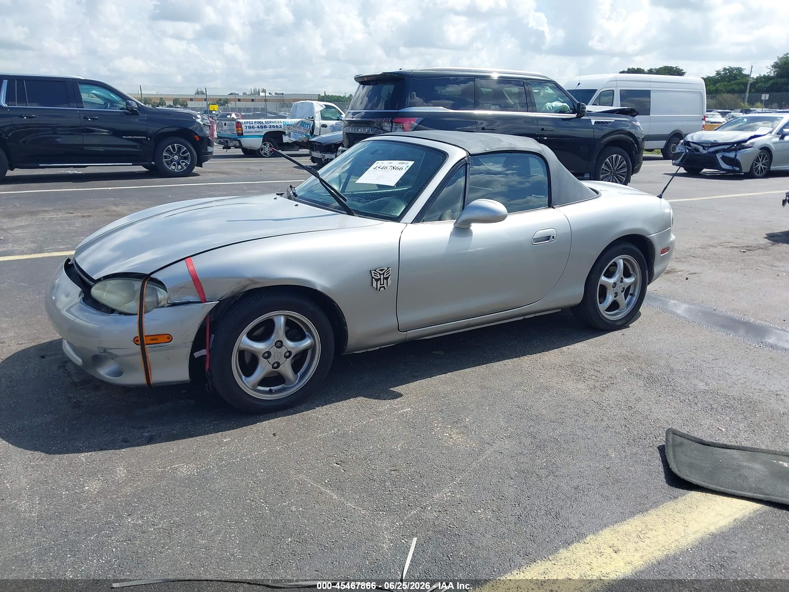 2001 Mazda Mx-5 VIN JM1NB353710215915 IAAI salvage auction — Unknown, Rebuildable (Florida), sold $1,400 on 2026-10-03 (photo 2)