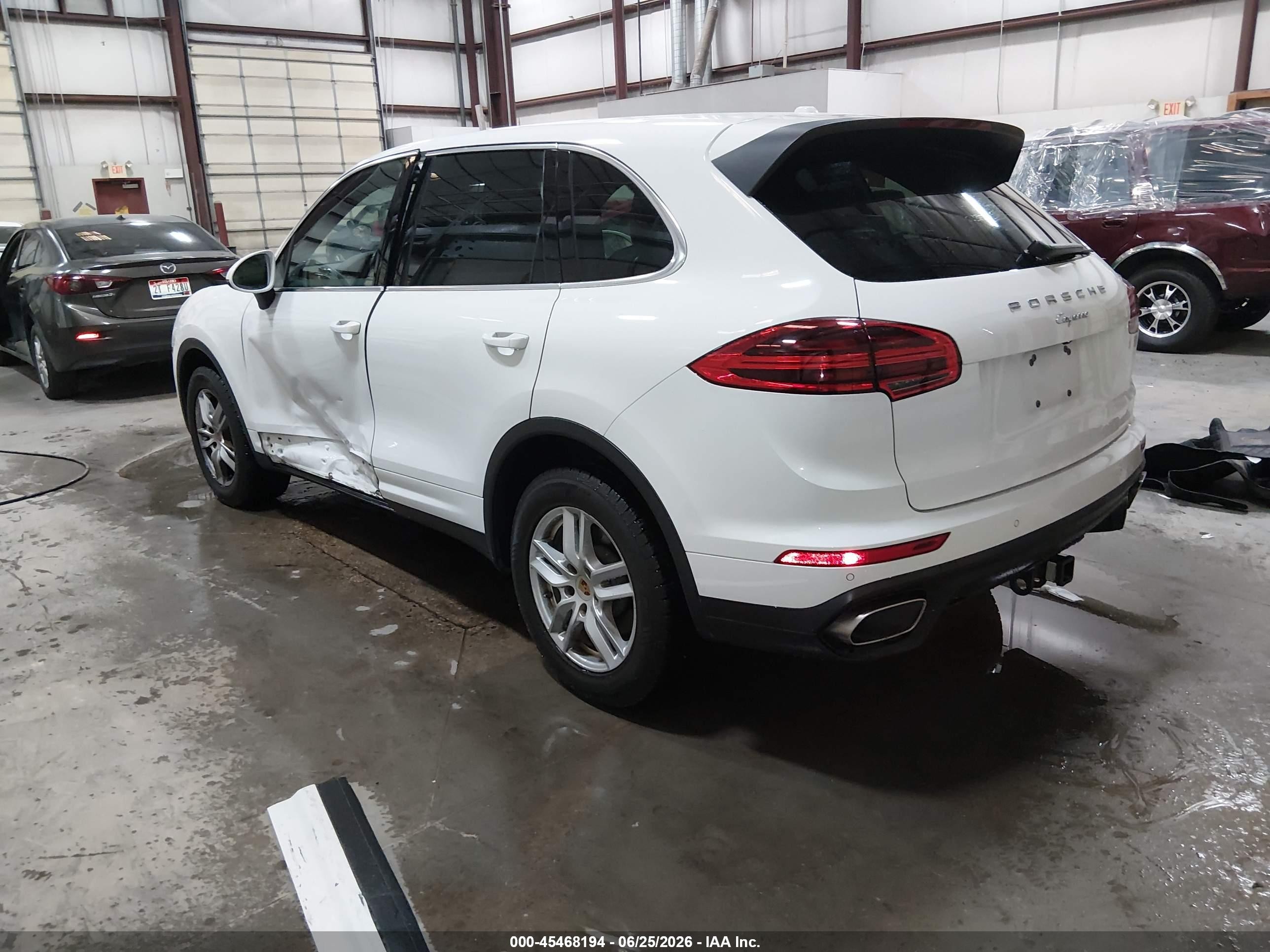2016 Porsche Cayenne VIN WP1AA2A24GLA06579 IAAI salvage auction — Side, Salvage (Idaho), sold $10,600 on 2026-09-29 (photo 3)