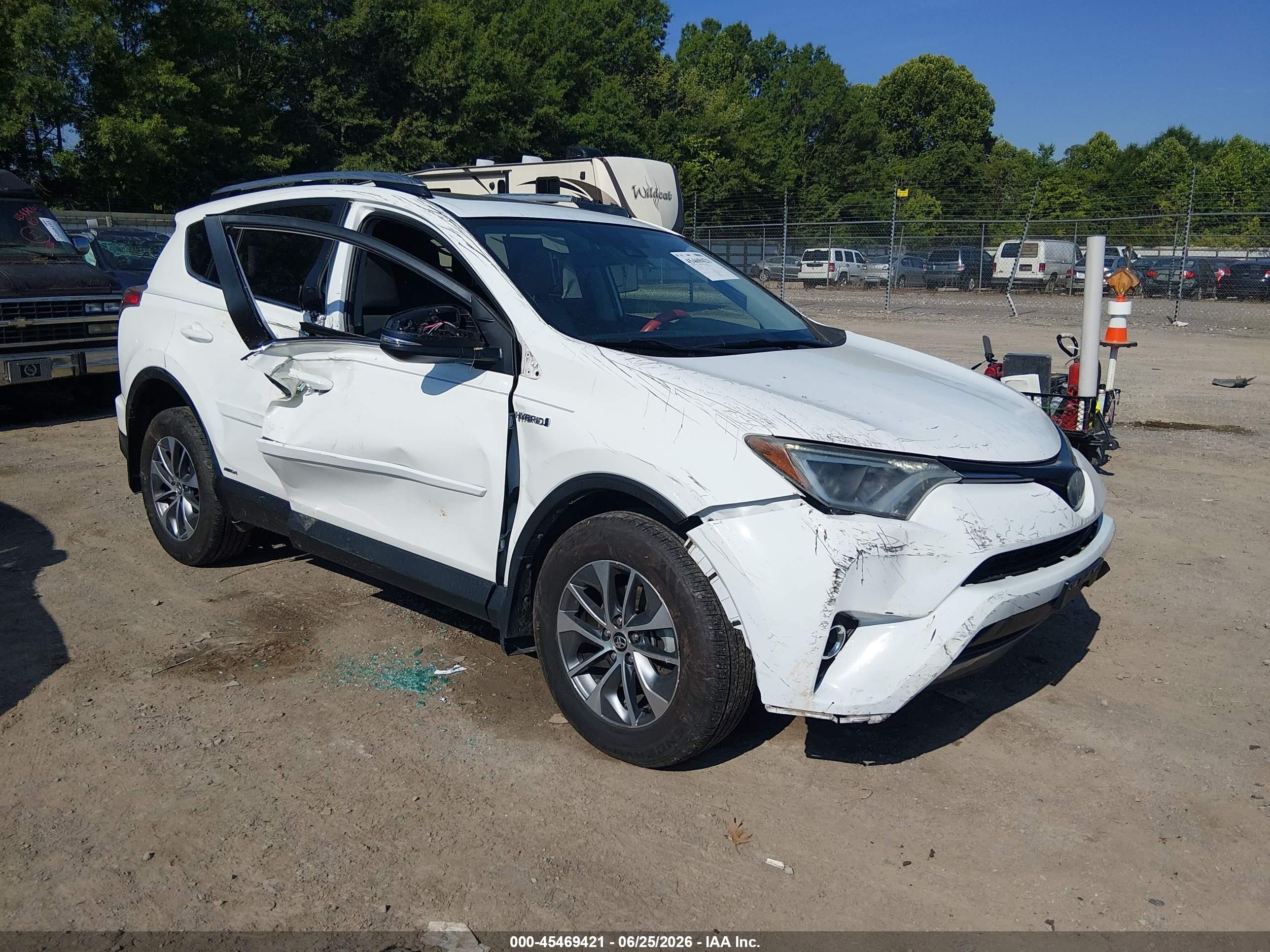 2017 Toyota RAV4 Hybrid VIN JTMRJREV5HD061135 IAAI salvage auction — Side, Salvage (Tennessee), sold $4,550 on 2026-07-10 (photo 1)
