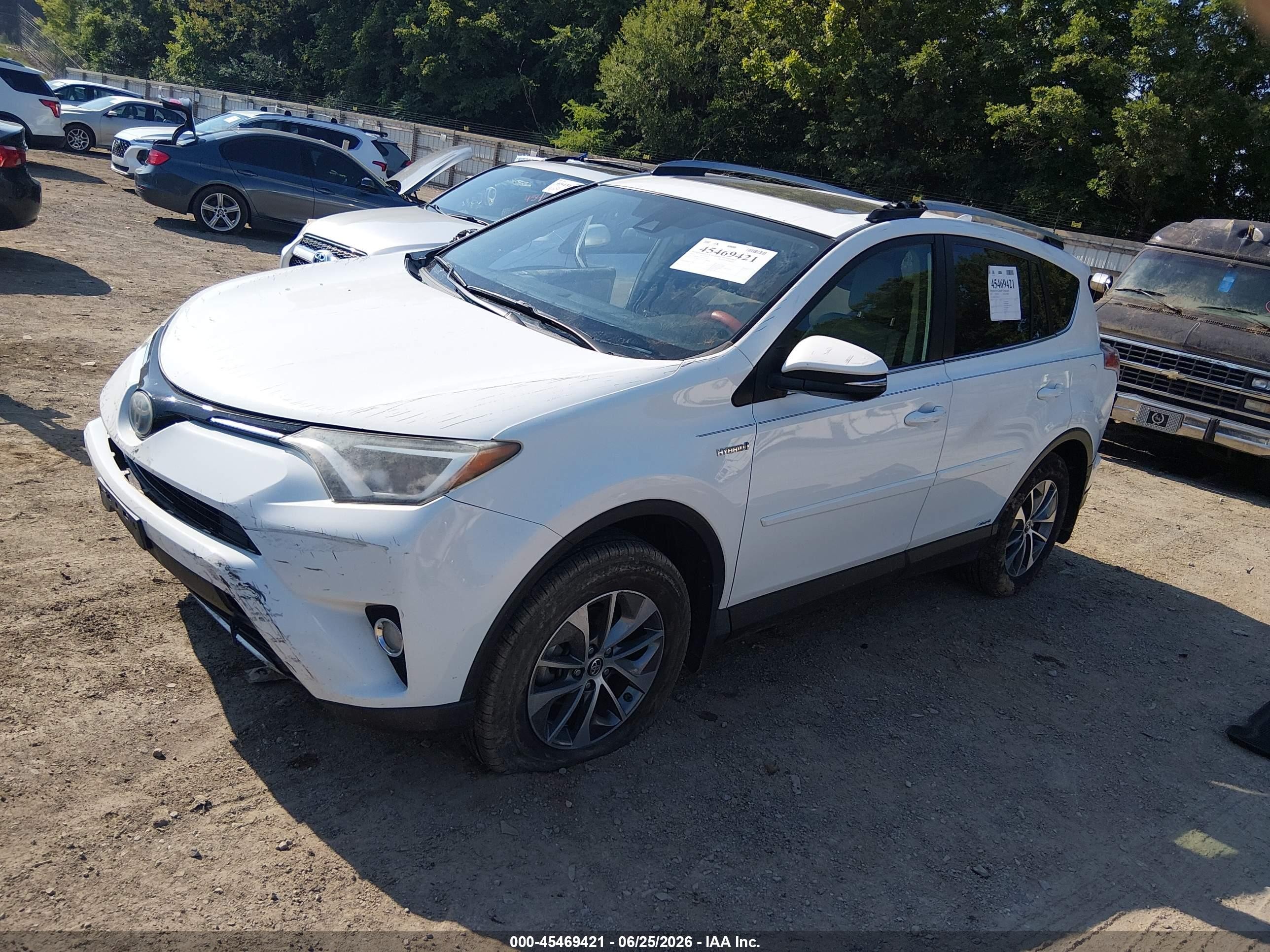 2017 Toyota RAV4 Hybrid VIN JTMRJREV5HD061135 IAAI salvage auction — Side, Salvage (Tennessee), sold $4,550 on 2026-07-10 (photo 2)