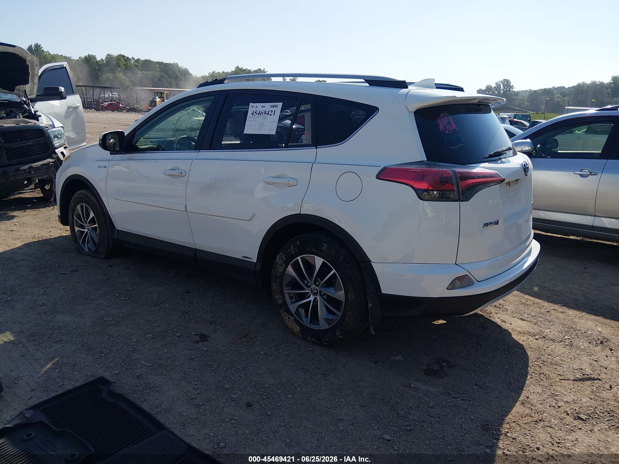 2017 Toyota RAV4 Hybrid VIN JTMRJREV5HD061135 IAAI salvage auction — Side, Salvage (Tennessee), sold $4,550 on 2026-07-10 (photo 3)