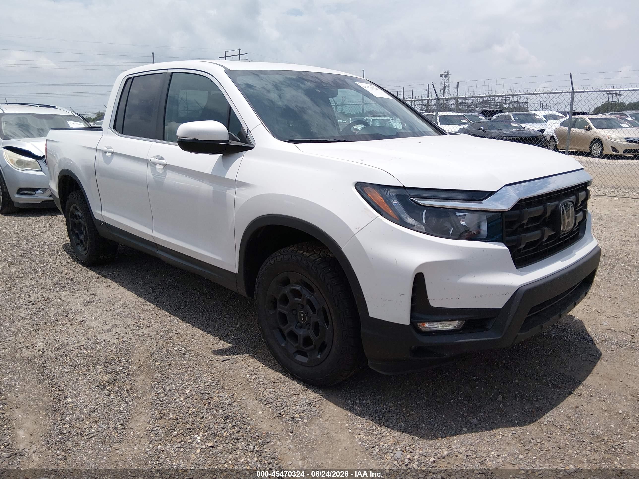 2025 Honda Ridgeline VIN 5FPYK3F4XSB017957 — IAAI salvage auction photo