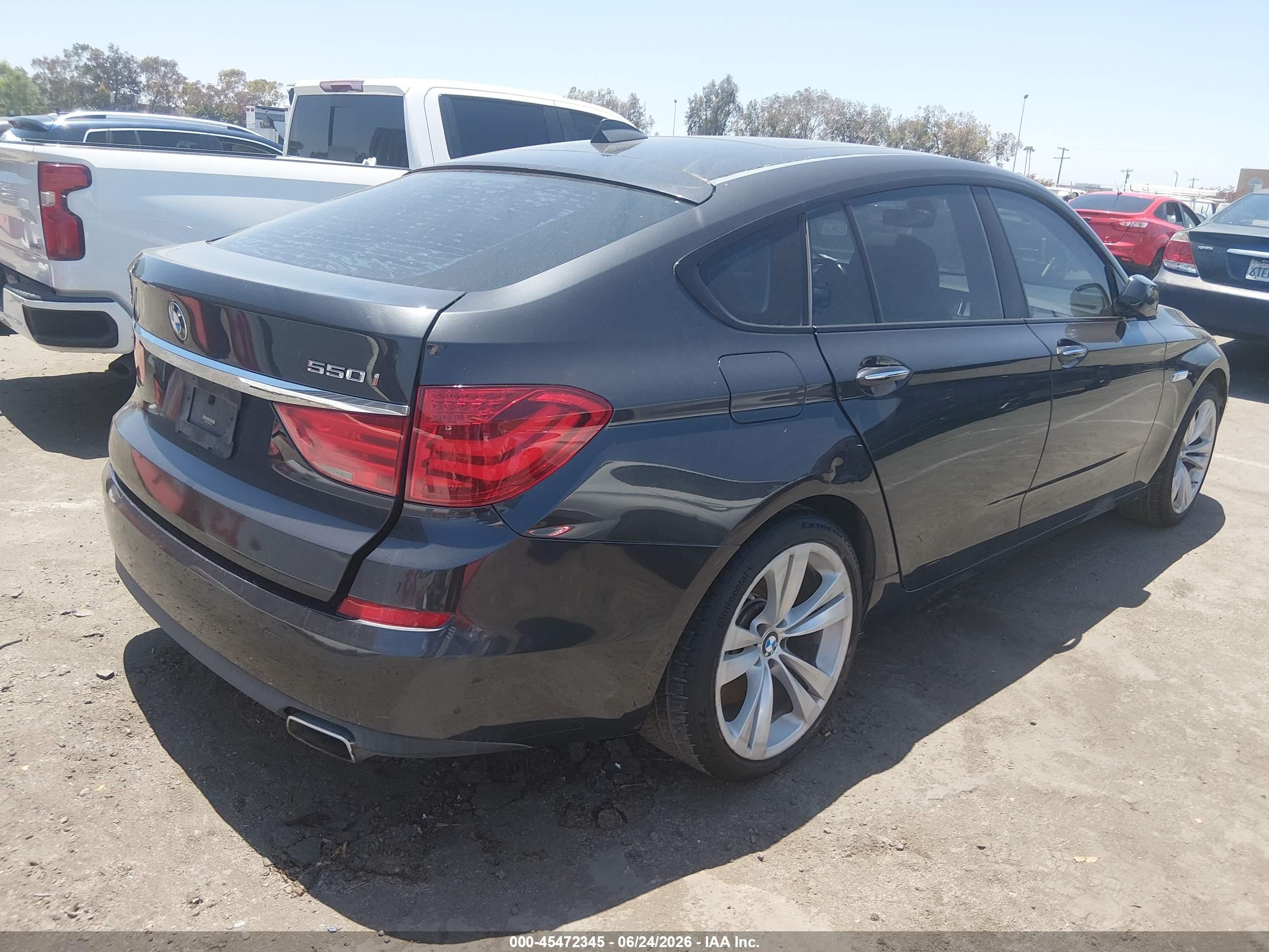 2011 BMW 5 Series VIN WBASN4C57BC210005 IAAI salvage auction — Normal Wear, Clear (Texas), sold $1,100 on 2026-07-09 (photo 4)
