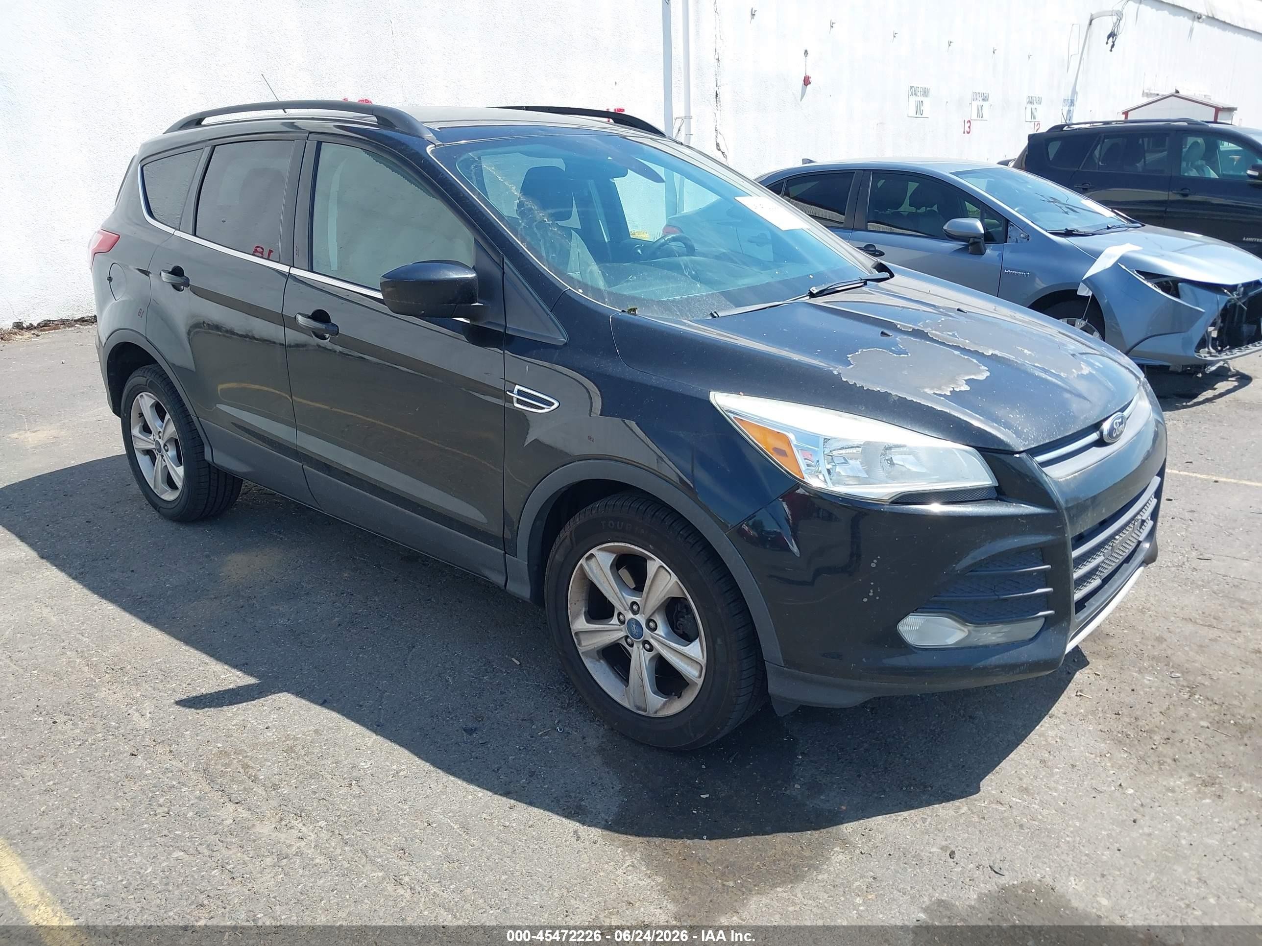 2013 Ford Escape VIN 1FMCU9G97DUA74312 IAAI salvage auction — Normal Wear, Clear-Dealer Only (Oregon), sold $650 on 2026-07-09 (photo 1)