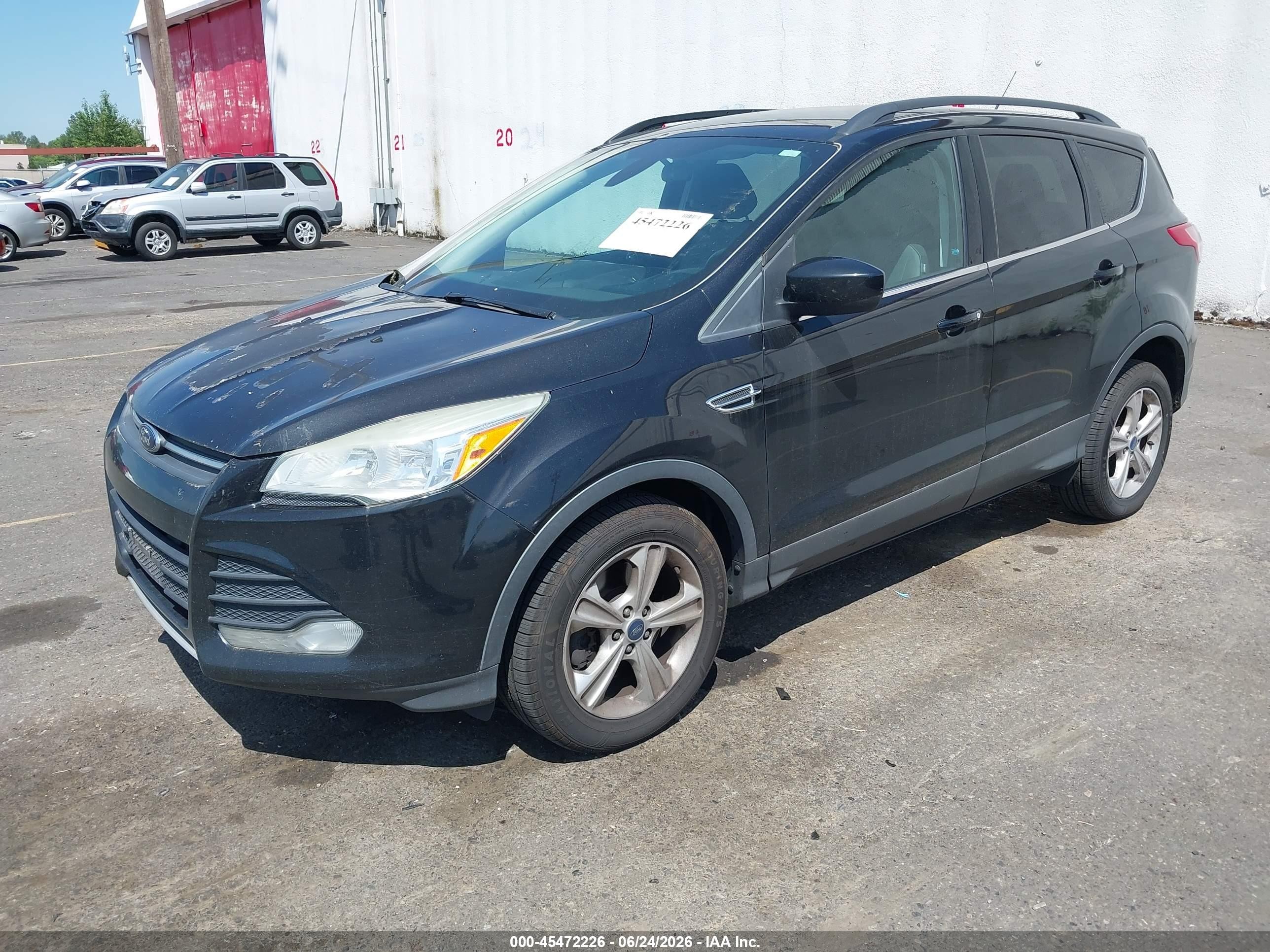 2013 Ford Escape VIN 1FMCU9G97DUA74312 IAAI salvage auction — Normal Wear, Clear-Dealer Only (Oregon), sold $650 on 2026-07-09 (photo 2)