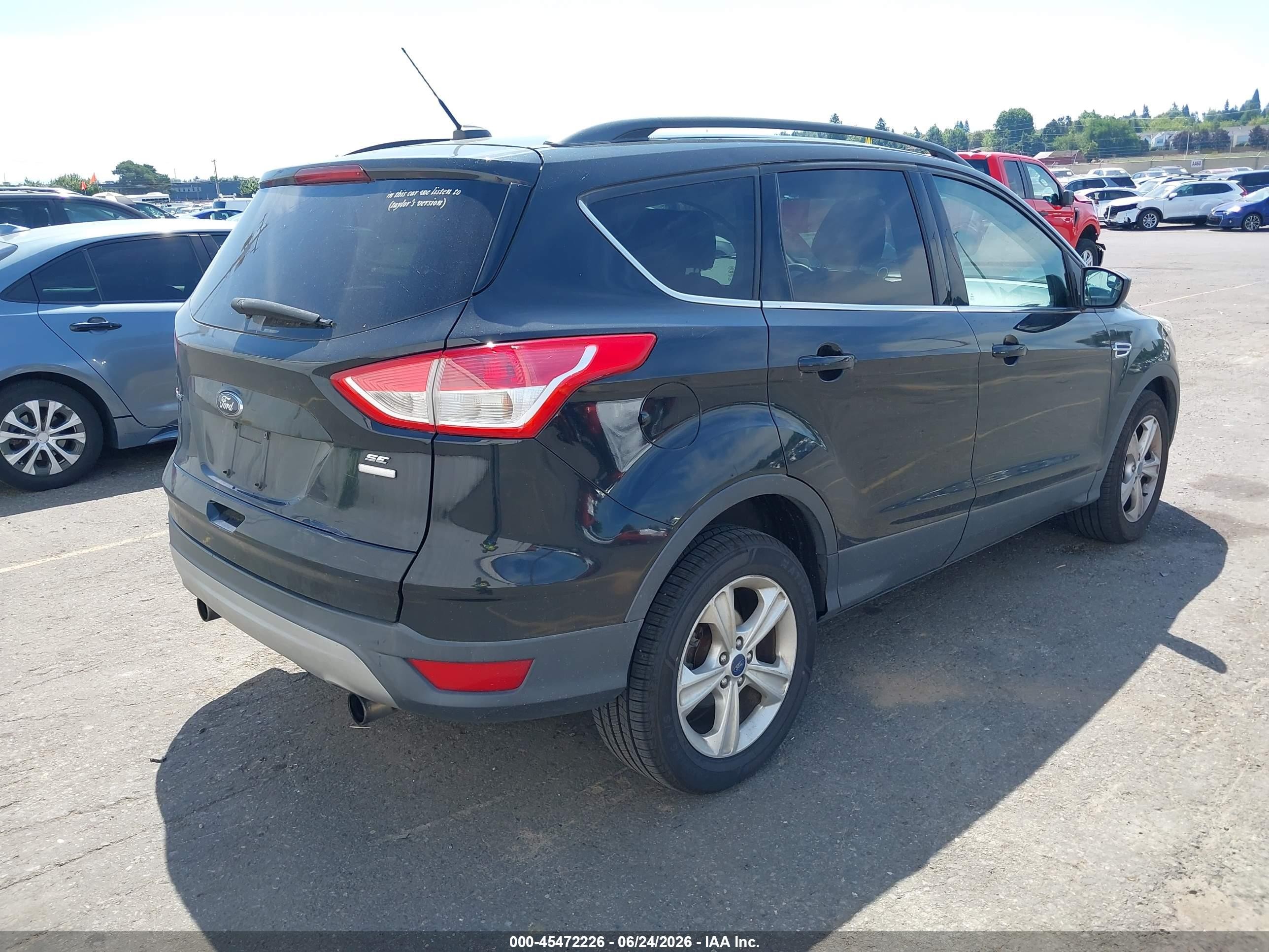2013 Ford Escape VIN 1FMCU9G97DUA74312 IAAI salvage auction — Normal Wear, Clear-Dealer Only (Oregon), sold $650 on 2026-07-09 (photo 4)