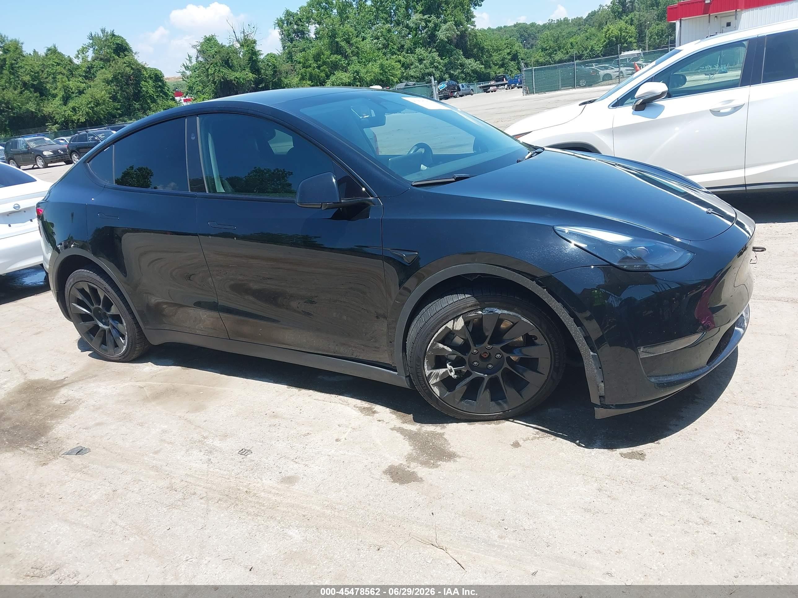 2024 Tesla Model y VIN 7SAYGDEE0RA214902 IAAI salvage auction — Unknown, Salvage - Greater Than 75% (Maryland), sold $7,350 on 2026-09-03 (photo 6)
