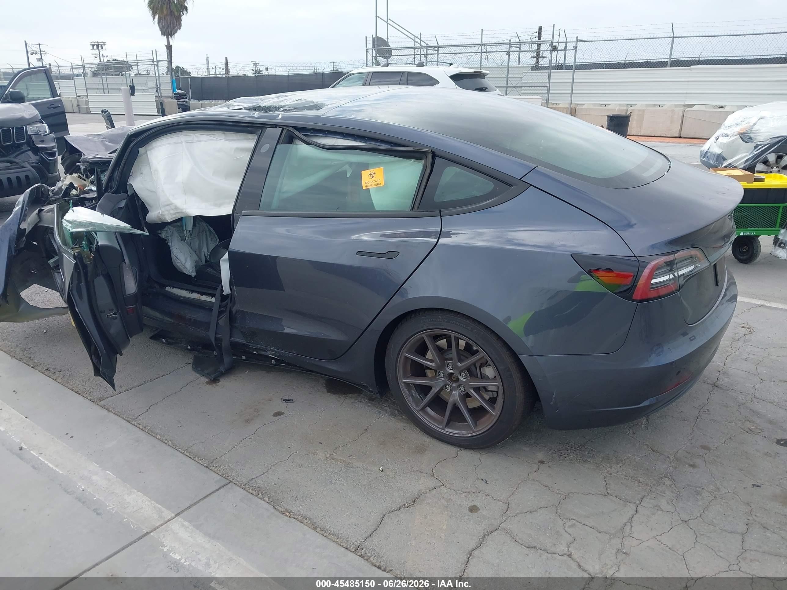 2021 Tesla Model 3 VIN 5YJ3E1EB9MF051020 IAAI salvage auction — All Over, Non-Repairable (California), sold $2,000 on 2026-10-02 (photo 3)