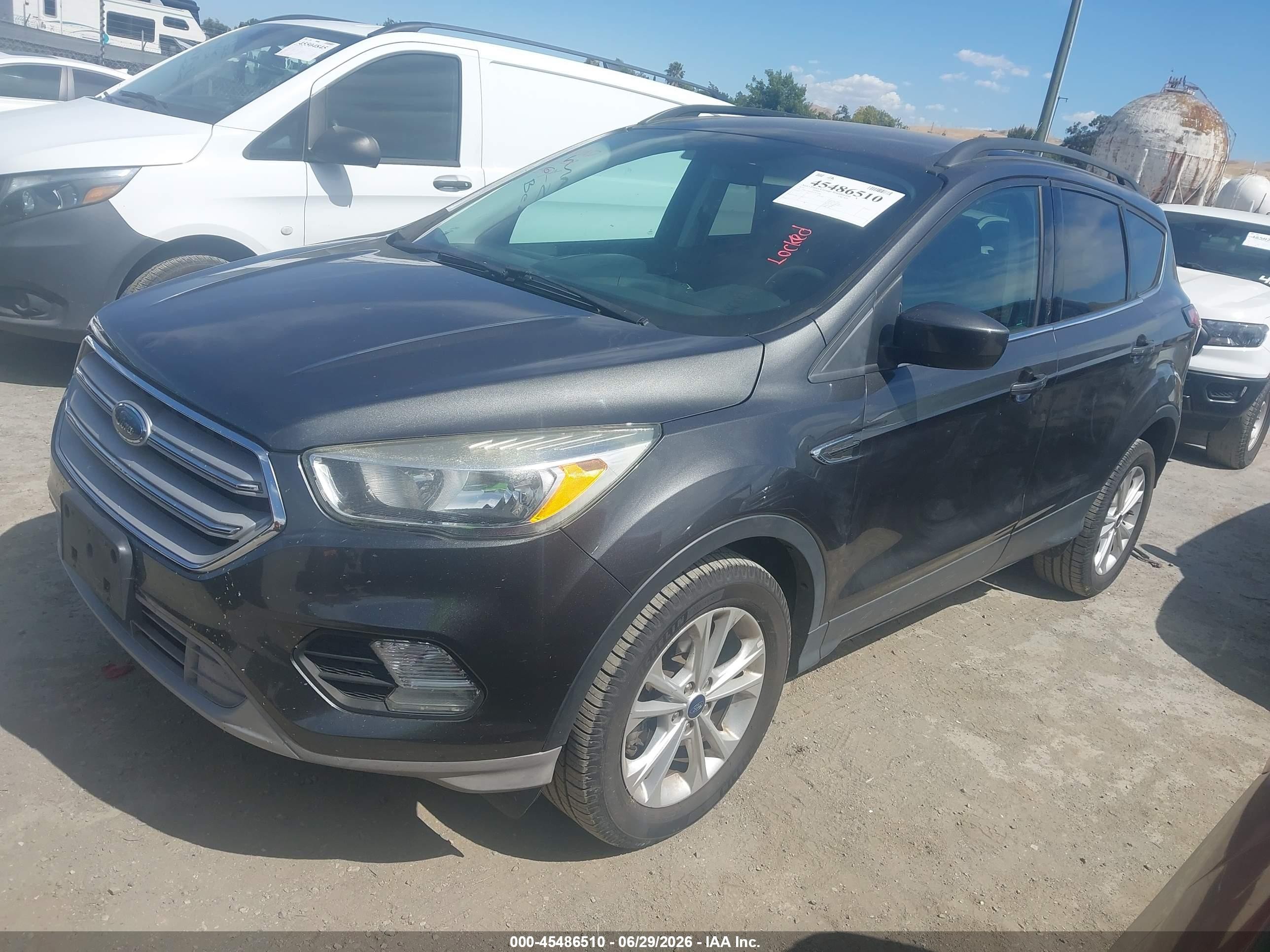2018 Ford Escape VIN 1FMCU9GD5JUA10768 IAAI salvage auction — Normal Wear, Clear - Dealer Only (California), sold $1,000 on 2026-07-09 (photo 2)