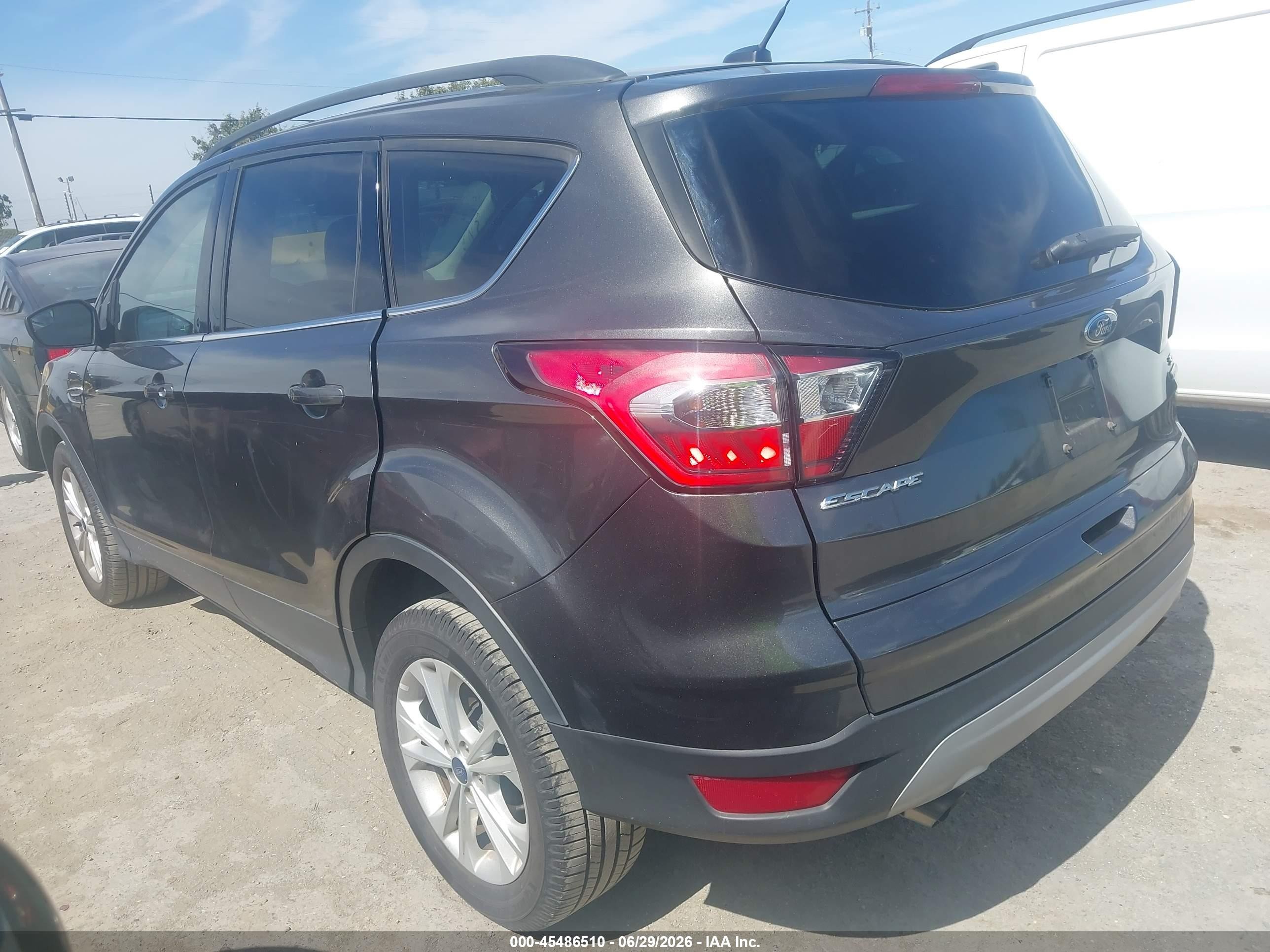 2018 Ford Escape VIN 1FMCU9GD5JUA10768 IAAI salvage auction — Normal Wear, Clear - Dealer Only (California), sold $1,000 on 2026-07-09 (photo 3)