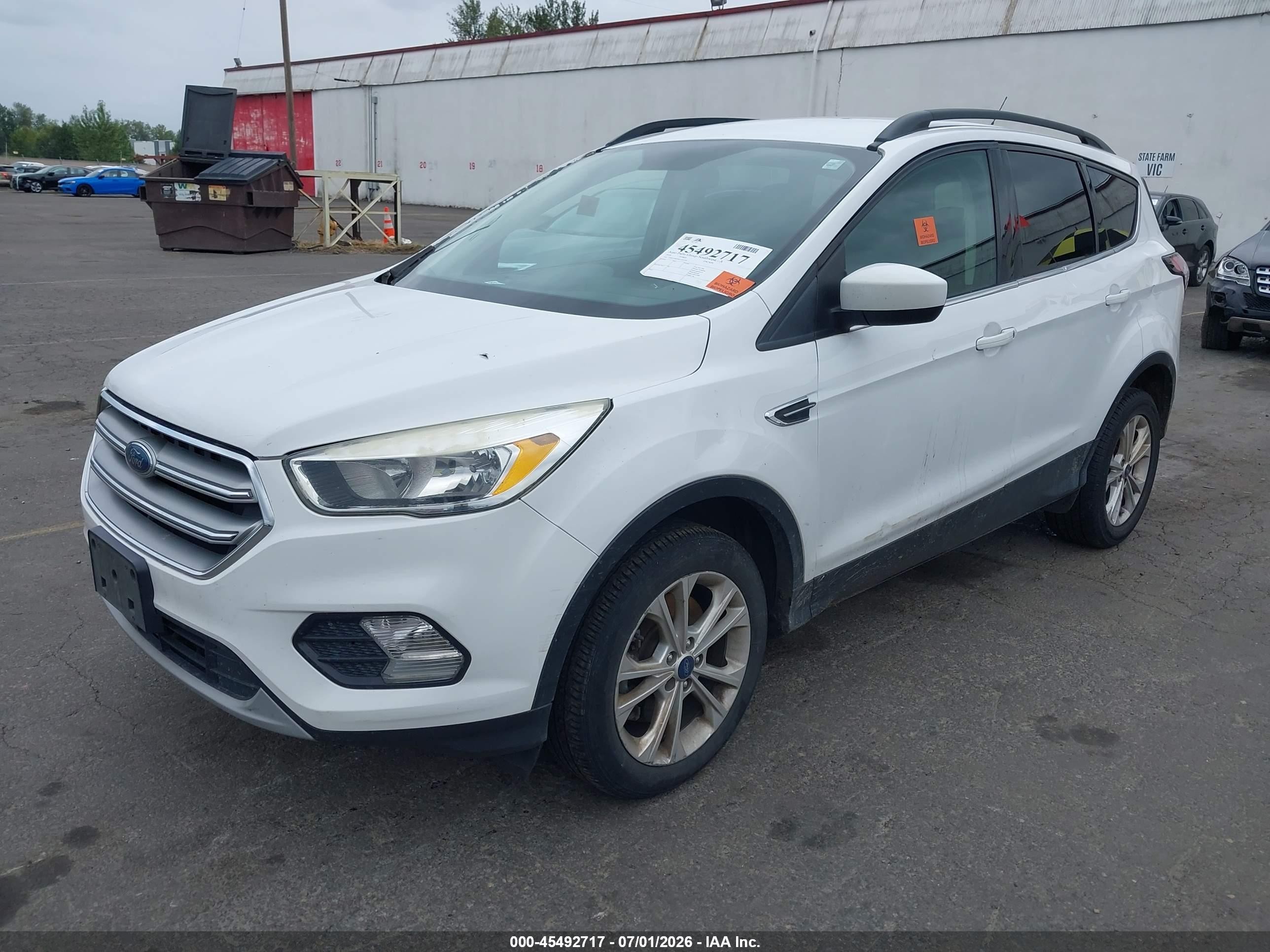 2018 Ford Escape VIN 1FMCU9GD9JUA87224 IAAI salvage auction — Normal Wear, Clear-Dealer Only (Oregon), sold $925 on 2026-07-09 (photo 2)