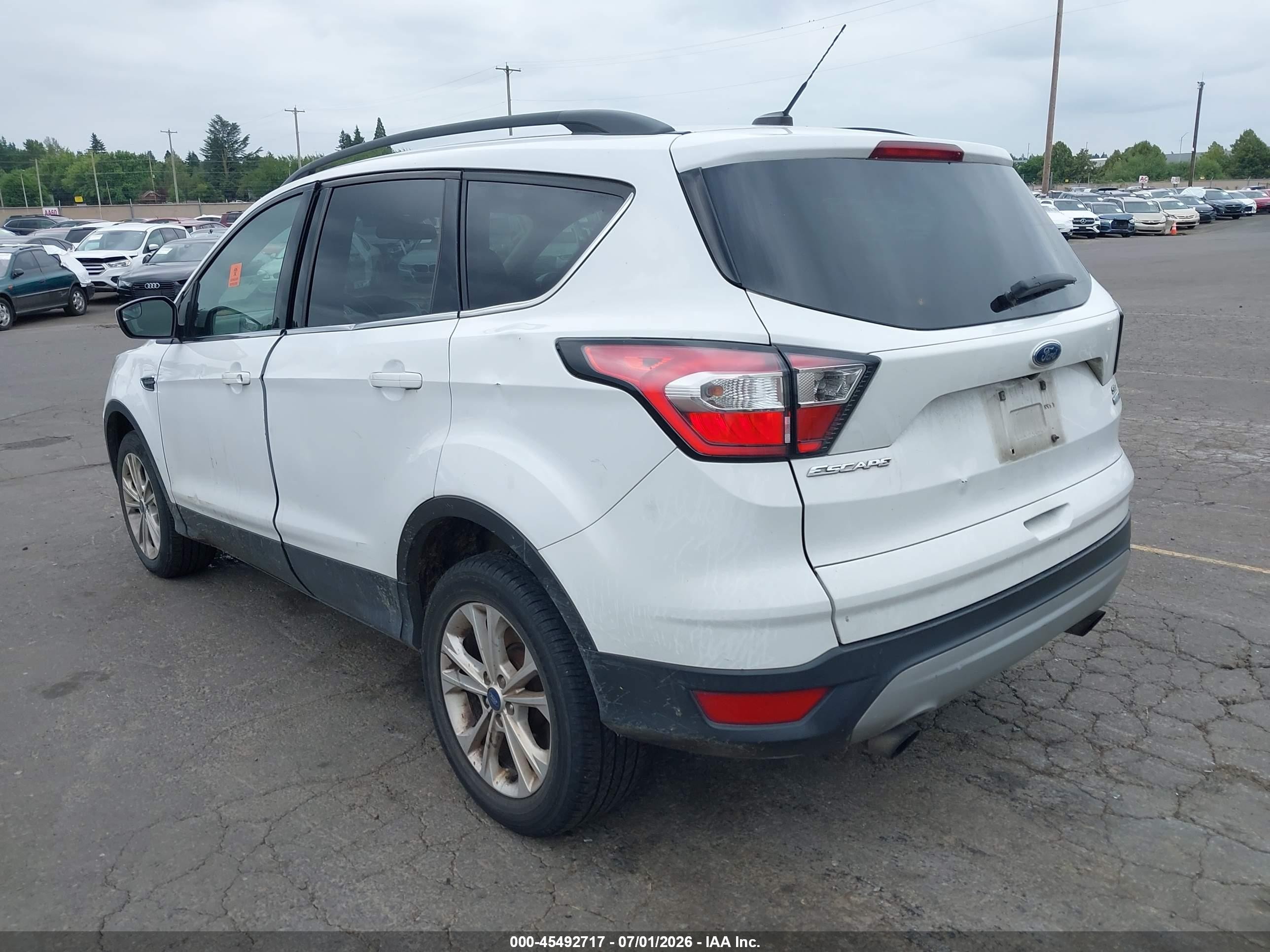 2018 Ford Escape VIN 1FMCU9GD9JUA87224 IAAI salvage auction — Normal Wear, Clear-Dealer Only (Oregon), sold $925 on 2026-07-09 (photo 3)